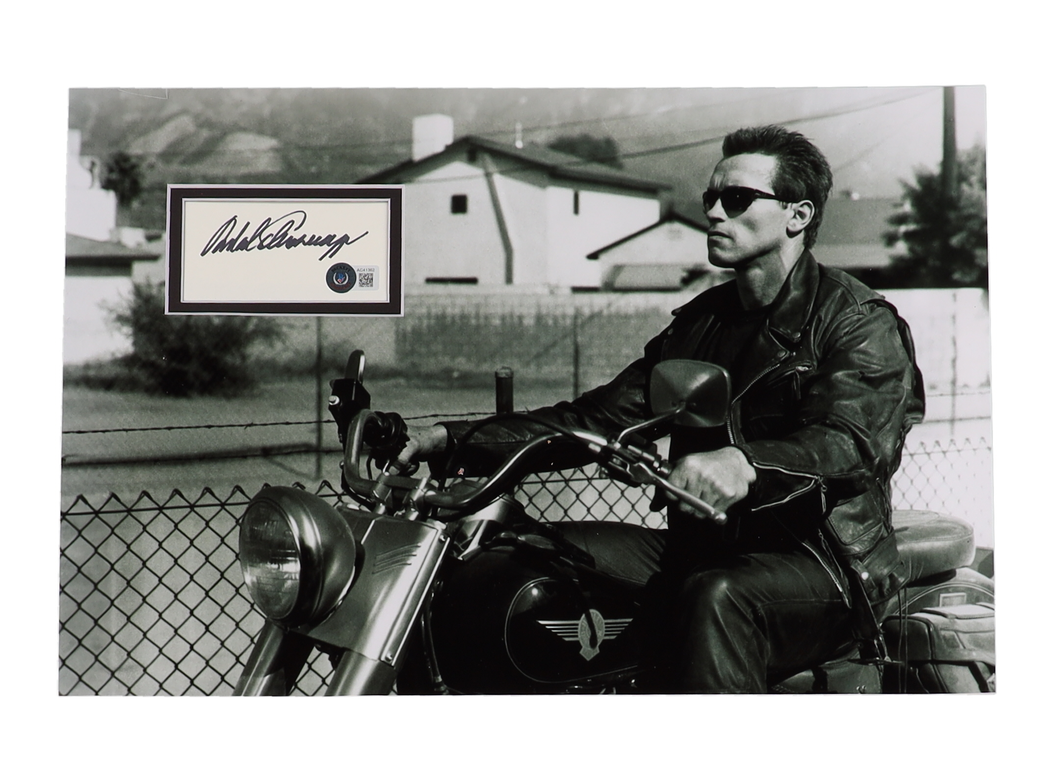 Arnold Schwarzenegger Signed "Terminator 2: Judgement Day" Custom Matted Cut Display (Beckett) at PristineAuction.com Arnold Schwarzenegger Signed "Terminator 2: Judgement Day" Custom Matted Cut Display (Beckett) at PristineAuction.com