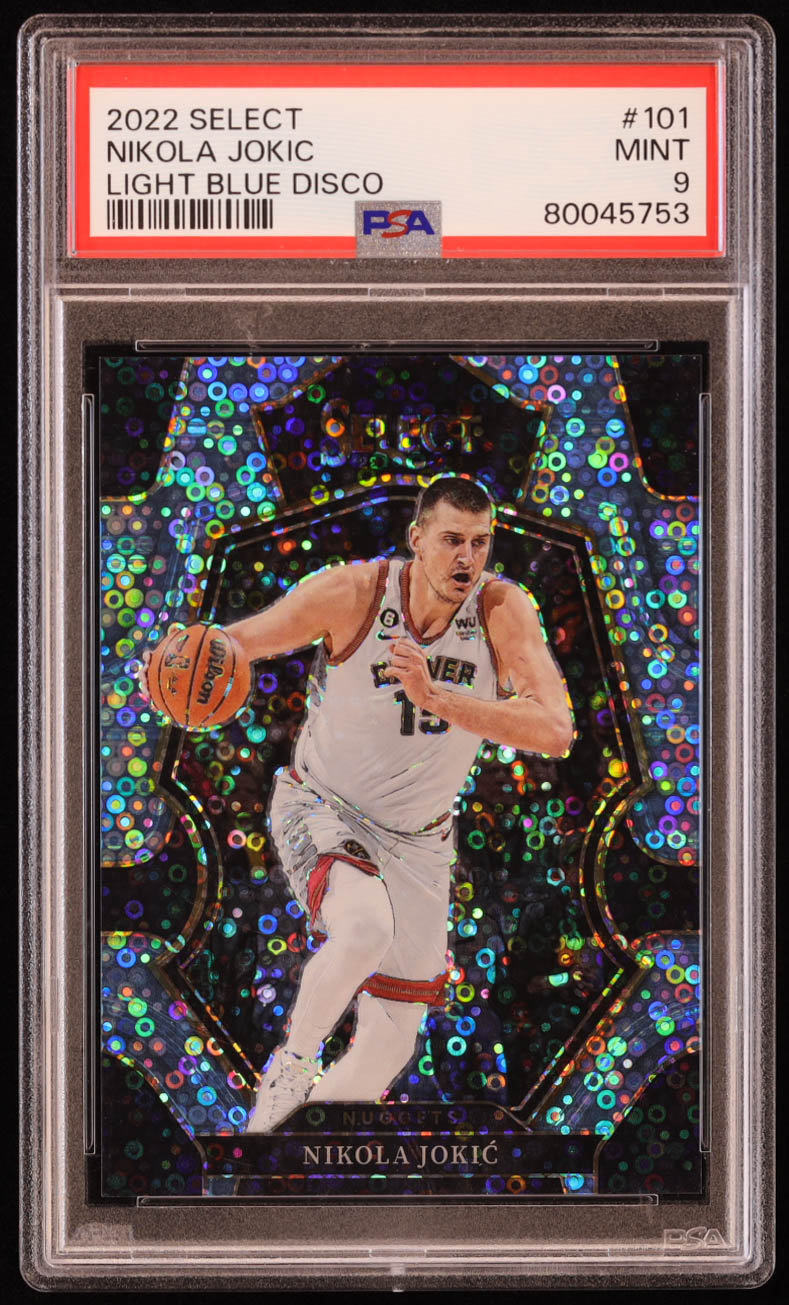 Nikola Jokic 2022-23 Select Prizms Light Blue Disco #101 #38/99 (PSA 9) at PristineAuction.com Nikola Jokic 2022-23 Select Prizms Light Blue Disco #101 #38/99 (PSA 9) at PristineAuction.com