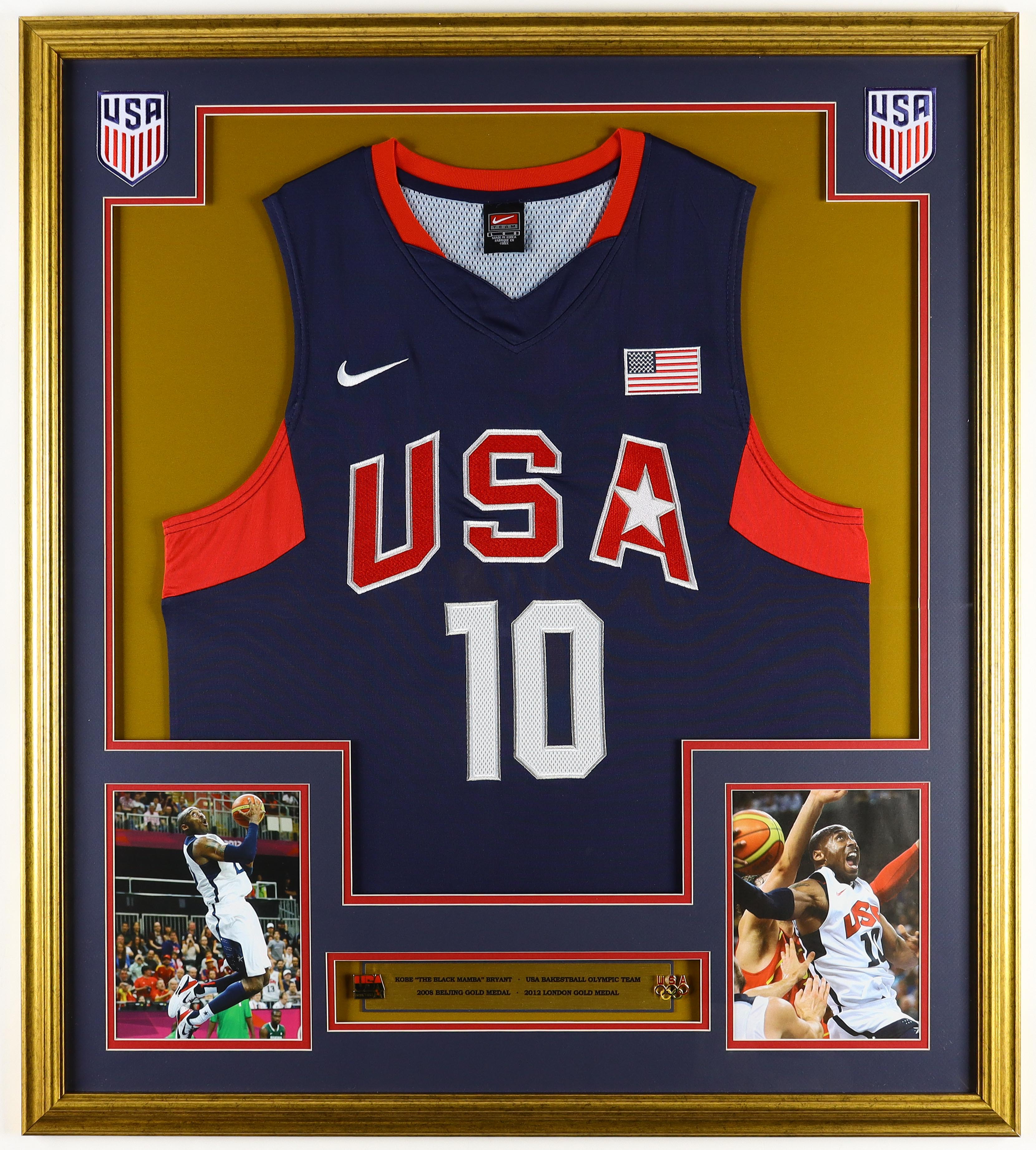 Kobe Bryant Custom Framed Team USA Nike Jersey Display with (2) Team USA Basketball Pins (2) Cloth Logo Patches at PristineAuction.com Kobe Bryant Custom Framed Team USA Nike Jersey Display with (2) Team USA Basketball Pins (2) Cloth Logo Patches at PristineAuction.com