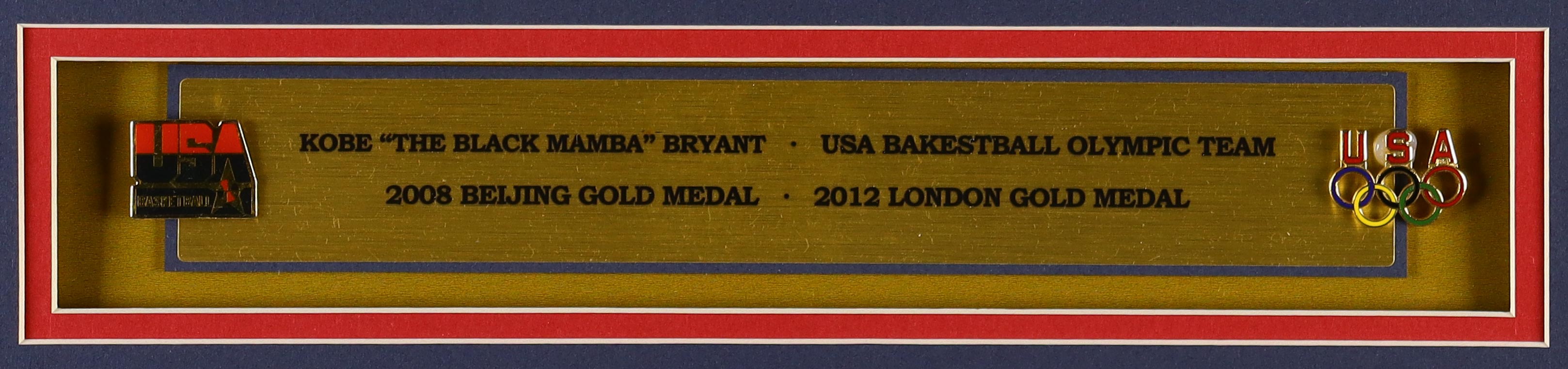 Kobe Bryant Custom Framed Team USA Nike Jersey Display with (2) Team USA Basketball Pins (2) Cloth Logo Patches at PristineAuction.com Kobe Bryant Custom Framed Team USA Nike Jersey Display with (2) Team USA Basketball Pins (2) Cloth Logo Patches at PristineAuction.com