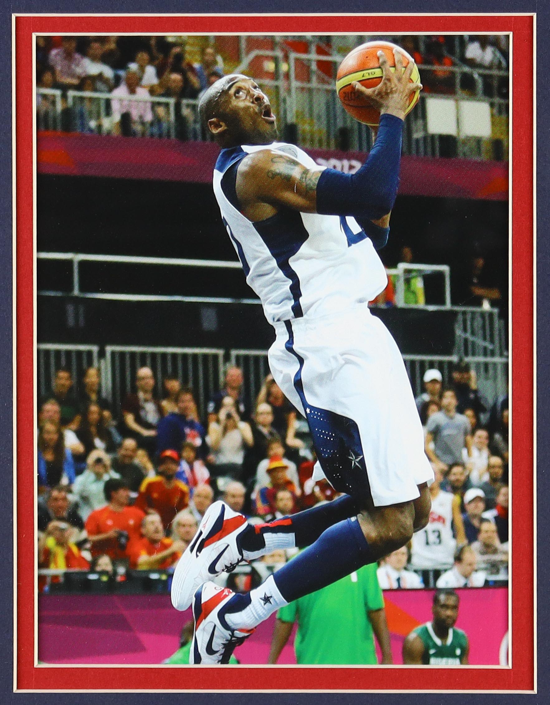 Kobe Bryant Custom Framed Team USA Nike Jersey Display with (2) Team USA Basketball Pins (2) Cloth Logo Patches at PristineAuction.com Kobe Bryant Custom Framed Team USA Nike Jersey Display with (2) Team USA Basketball Pins (2) Cloth Logo Patches at PristineAuction.com