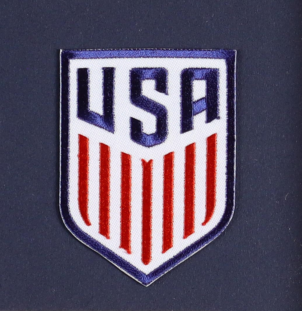 Kobe Bryant Custom Framed Team USA Nike Jersey Display with (2) Team USA Basketball Pins (2) Cloth Logo Patches at PristineAuction.com Kobe Bryant Custom Framed Team USA Nike Jersey Display with (2) Team USA Basketball Pins (2) Cloth Logo Patches at PristineAuction.com