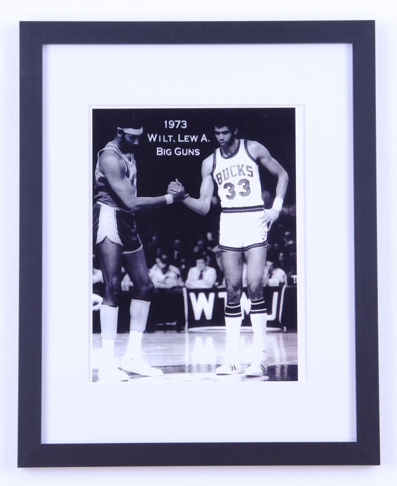 Wilt Chamberlain & Lewis Alcindor Jr. "Big Guns" Custom Framed Photo at PristineAuction.com Wilt Chamberlain & Lewis Alcindor Jr. "Big Guns" Custom Framed Photo at PristineAuction.com
