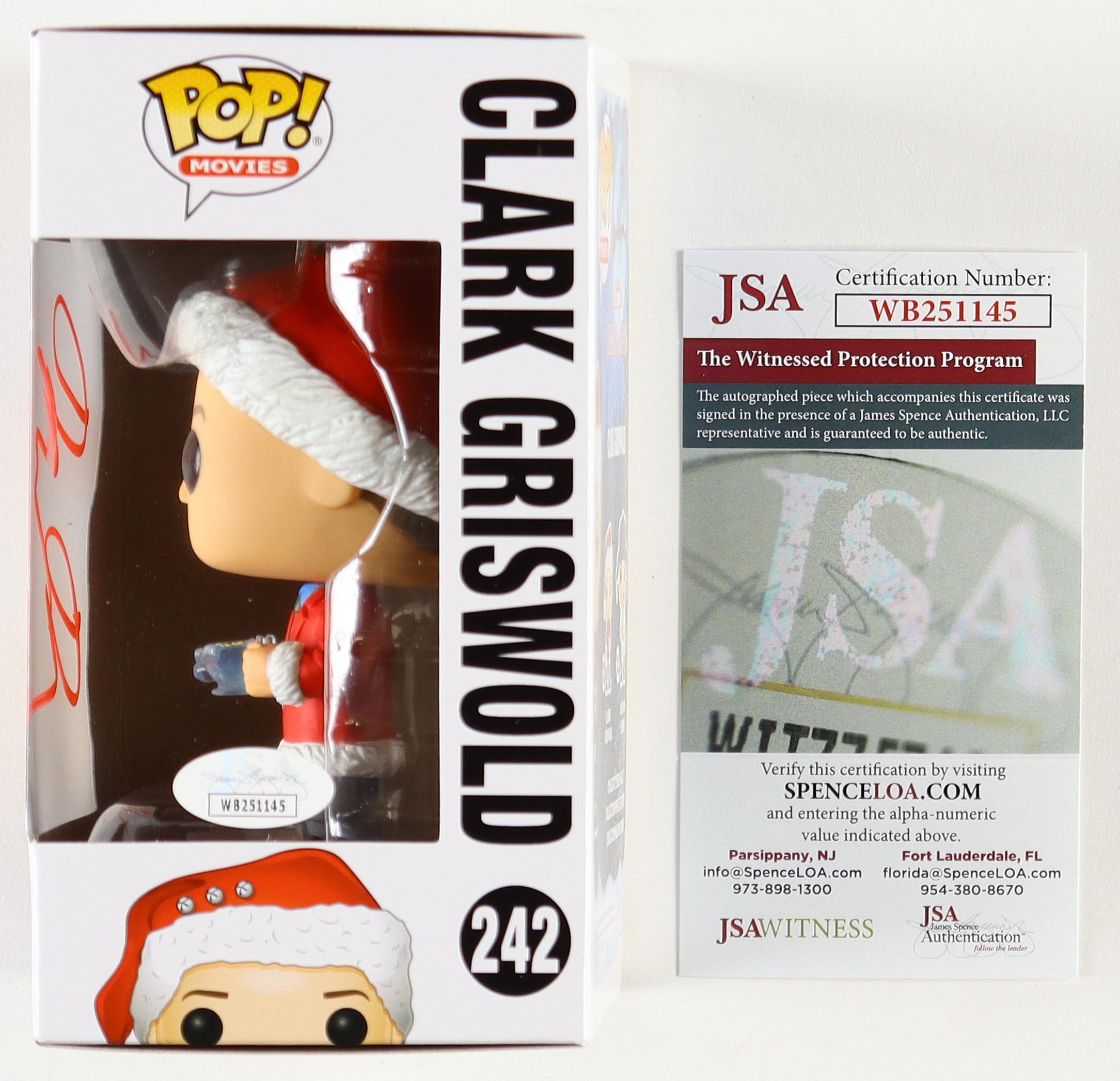 Chevy Chase Signed "National Lampoon's Christmas Vacation" #242 Clark Griswold Funko Pop! Vinyl Figure (JSA) (See Description) at PristineAuction.com Chevy Chase Signed "National Lampoon's Christmas Vacation" #242 Clark Griswold Funko Pop! Vinyl Figure (JSA) (See Description) at PristineAuction.com