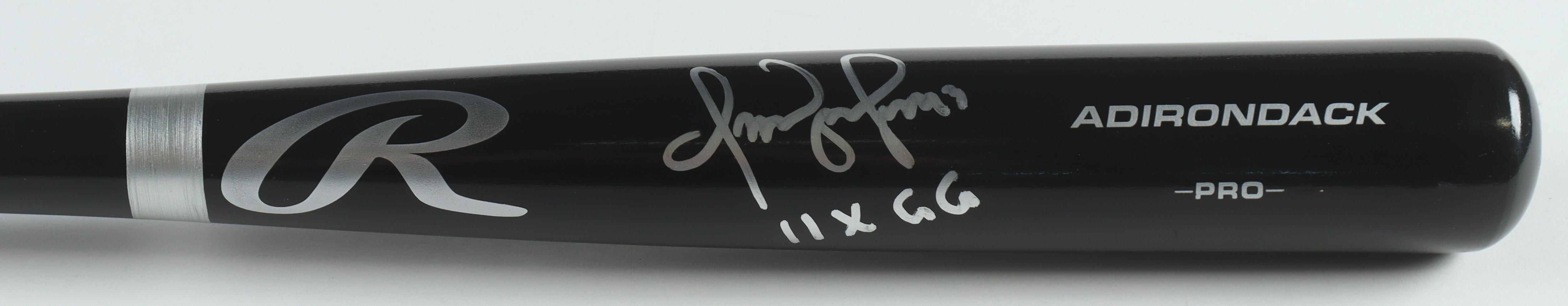 Omar Vizquel Signed Rawlings Pro Baseball Bat Inscribed "11x GG" (JSA) at PristineAuction.com Omar Vizquel Signed Rawlings Pro Baseball Bat Inscribed "11x GG" (JSA) at PristineAuction.com