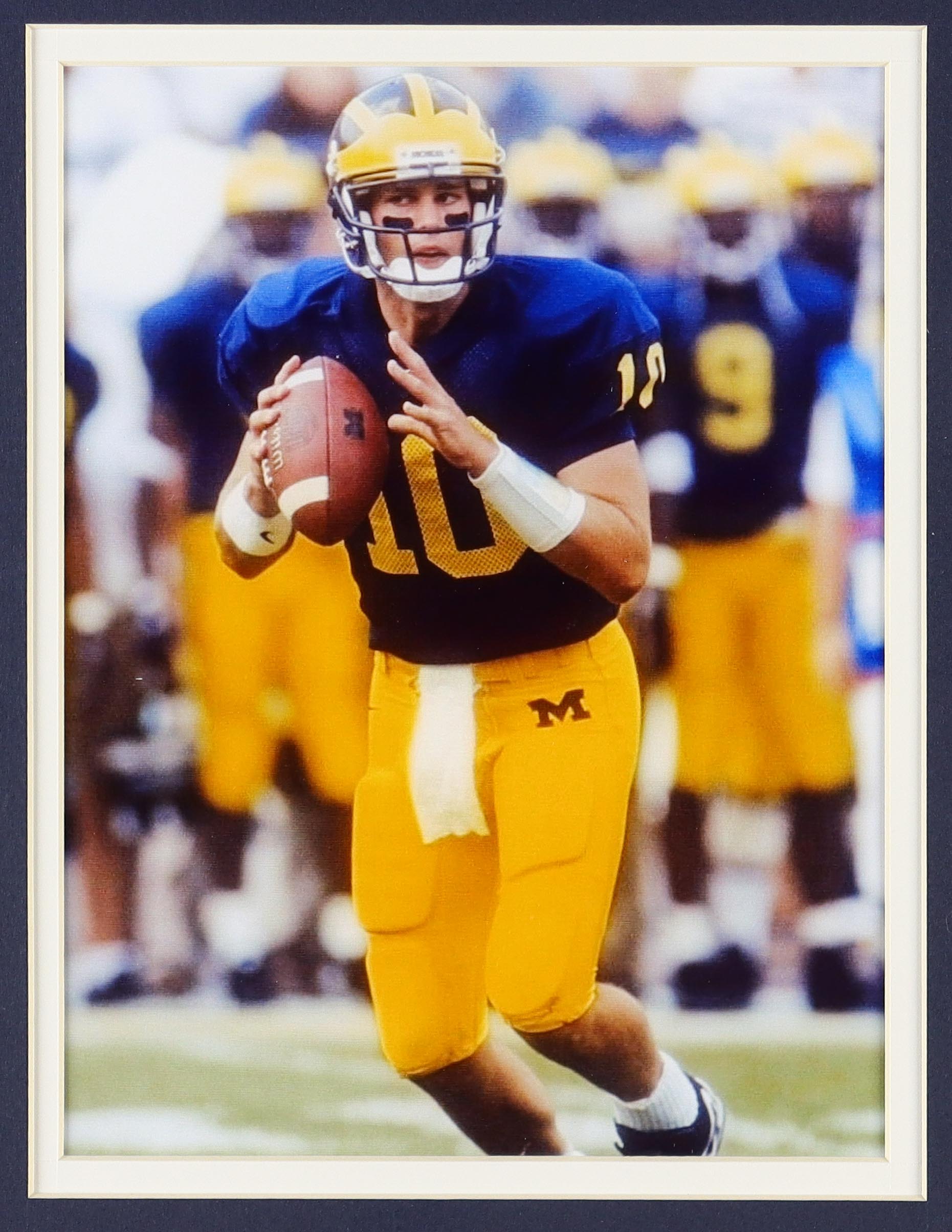 Tom Brady Michigan Wolverines Custom Framed Nike Air Jordan Jersey Display With (2) Team Logo Pins & (2) Cloth Patch Emblems at PristineAuction.com Tom Brady Michigan Wolverines Custom Framed Nike Air Jordan Jersey Display With (2) Team Logo Pins & (2) Cloth Patch Emblems at PristineAuction.com