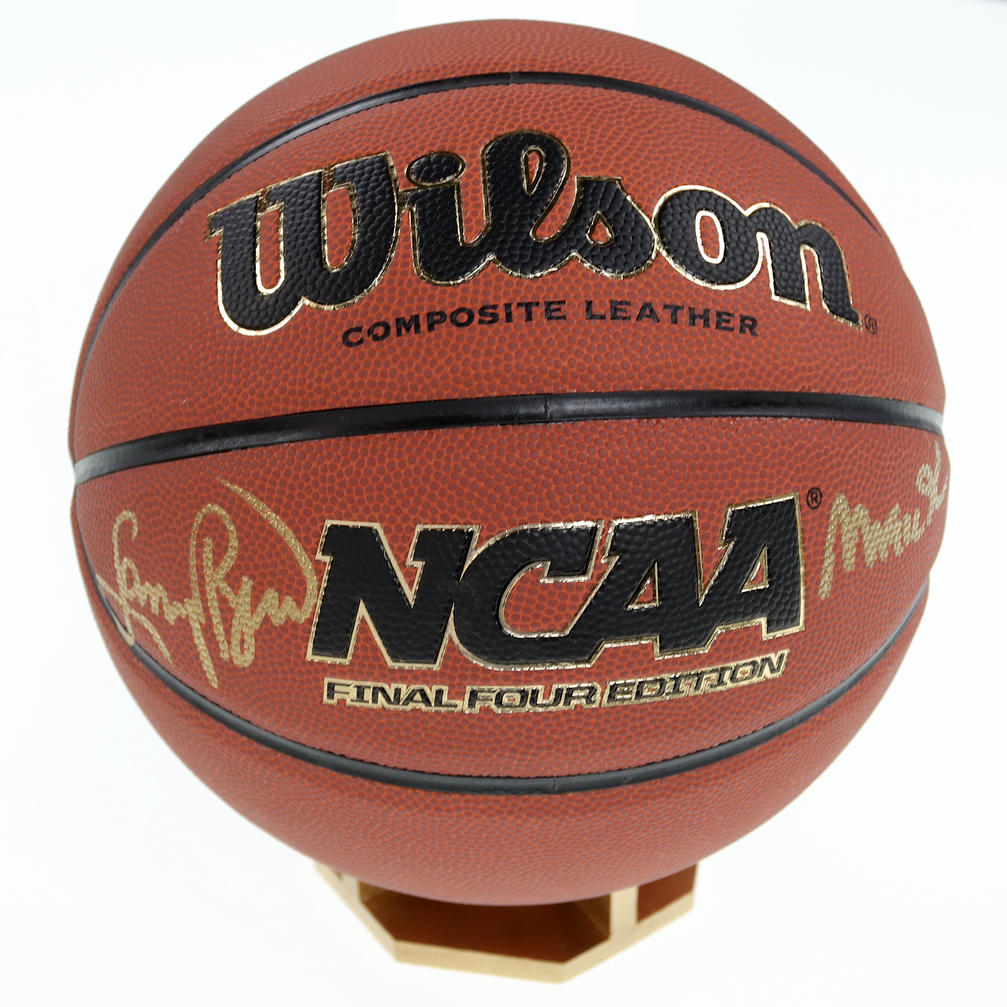Magic Johnson & Larry Bird Signed NCAA Special Final Four Edition Basketball with All Wood Basketball Stand (PSA & Beckett) at PristineAuction.com Magic Johnson & Larry Bird Signed NCAA Special Final Four Edition Basketball with All Wood Basketball Stand (PSA & Beckett) at PristineAuction.com
