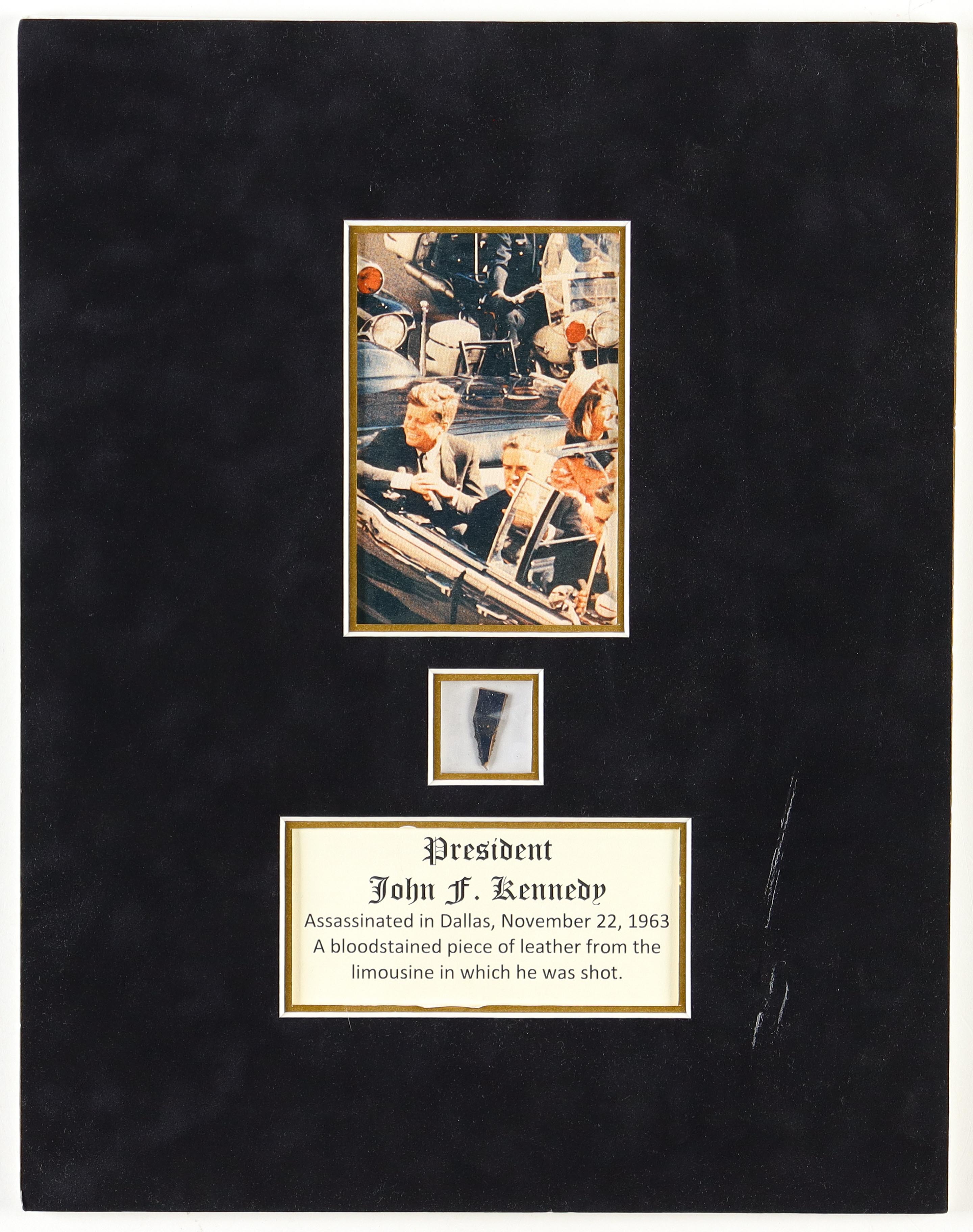 John F. Kennedy 1963 Assassination Custom Matted Blood-Stained Leather Seat Piece (University Archives) at PristineAuction.com John F. Kennedy 1963 Assassination Custom Matted Blood-Stained Leather Seat Piece (University Archives) at PristineAuction.com