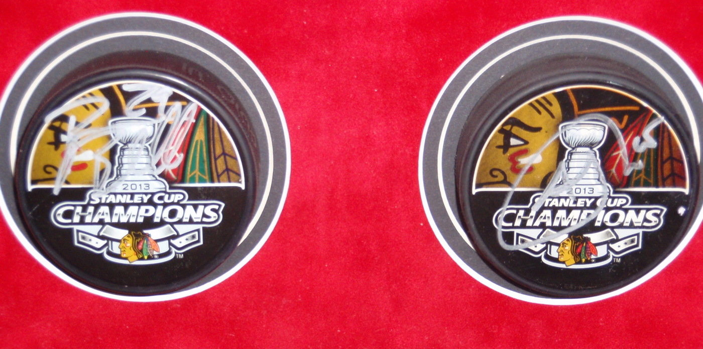 Blackhawks Shadowbox Display with (23) Signed Pucks including Jonathan Toews, Patrick Kane, Andrew Shaw, Bryan Bickell, Nick Leddy, Marian Hossa, Corey Crawford (JSA COA, Schwartz COA, Frameworth COA & WSD COA) at PristineAuction.com Blackhawks Shadowbox Display with (23) Signed Pucks including Jonathan Toews, Patrick Kane, Andrew Shaw, Bryan Bickell, Nick Leddy, Marian Hossa, Corey Crawford (JSA COA, Schwartz COA, Frameworth COA & WSD COA) at PristineAuction.com