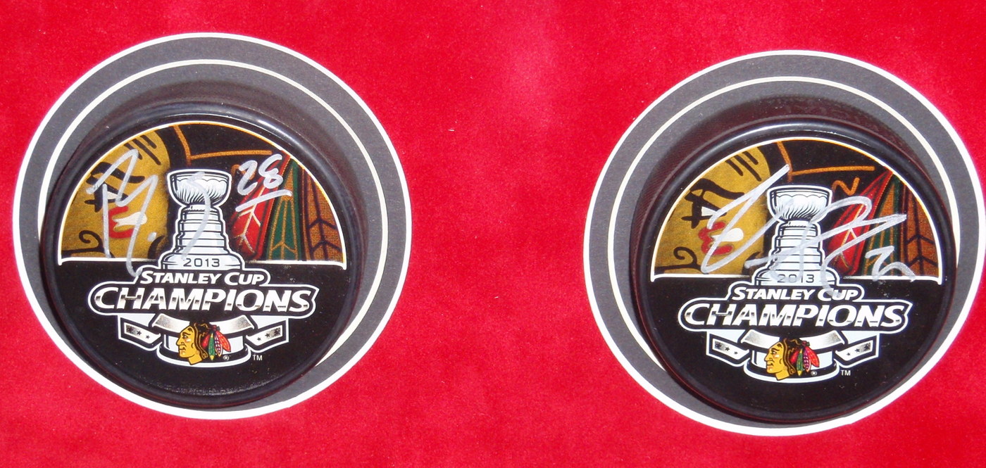 Blackhawks Shadowbox Display with (23) Signed Pucks including Jonathan Toews, Patrick Kane, Andrew Shaw, Bryan Bickell, Nick Leddy, Marian Hossa, Corey Crawford (JSA COA, Schwartz COA, Frameworth COA & WSD COA) at PristineAuction.com Blackhawks Shadowbox Display with (23) Signed Pucks including Jonathan Toews, Patrick Kane, Andrew Shaw, Bryan Bickell, Nick Leddy, Marian Hossa, Corey Crawford (JSA COA, Schwartz COA, Frameworth COA & WSD COA) at PristineAuction.com