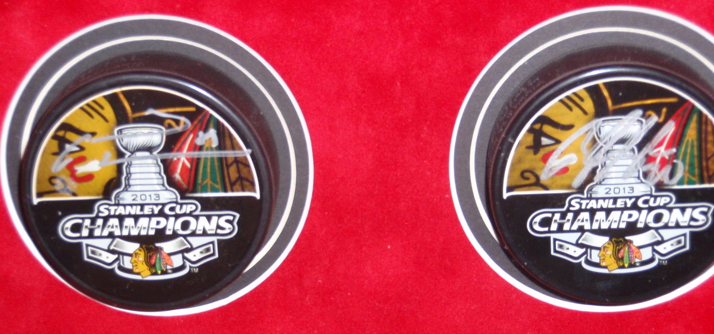 Blackhawks Shadowbox Display with (23) Signed Pucks including Jonathan Toews, Patrick Kane, Andrew Shaw, Bryan Bickell, Nick Leddy, Marian Hossa, Corey Crawford (JSA COA, Schwartz COA, Frameworth COA & WSD COA) at PristineAuction.com Blackhawks Shadowbox Display with (23) Signed Pucks including Jonathan Toews, Patrick Kane, Andrew Shaw, Bryan Bickell, Nick Leddy, Marian Hossa, Corey Crawford (JSA COA, Schwartz COA, Frameworth COA & WSD COA) at PristineAuction.com