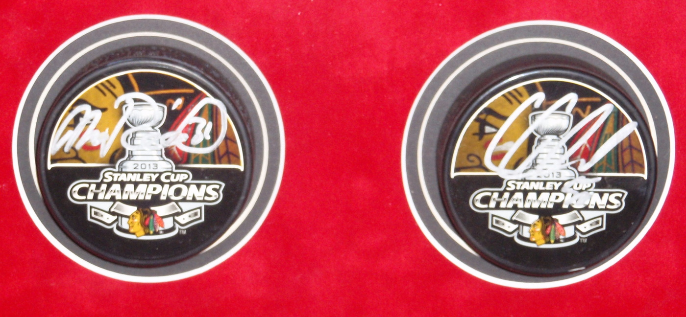 Blackhawks Shadowbox Display with (23) Signed Pucks including Jonathan Toews, Patrick Kane, Andrew Shaw, Bryan Bickell, Nick Leddy, Marian Hossa, Corey Crawford (JSA COA, Schwartz COA, Frameworth COA & WSD COA) at PristineAuction.com Blackhawks Shadowbox Display with (23) Signed Pucks including Jonathan Toews, Patrick Kane, Andrew Shaw, Bryan Bickell, Nick Leddy, Marian Hossa, Corey Crawford (JSA COA, Schwartz COA, Frameworth COA & WSD COA) at PristineAuction.com