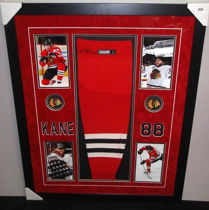 Patrick Kane Signed Blackhawks 35x43 Custom Framed Game-Used Sock Display (JSA LOA) at PristineAuction.com Patrick Kane Signed Blackhawks 35x43 Custom Framed Game-Used Sock Display (JSA LOA) at PristineAuction.com