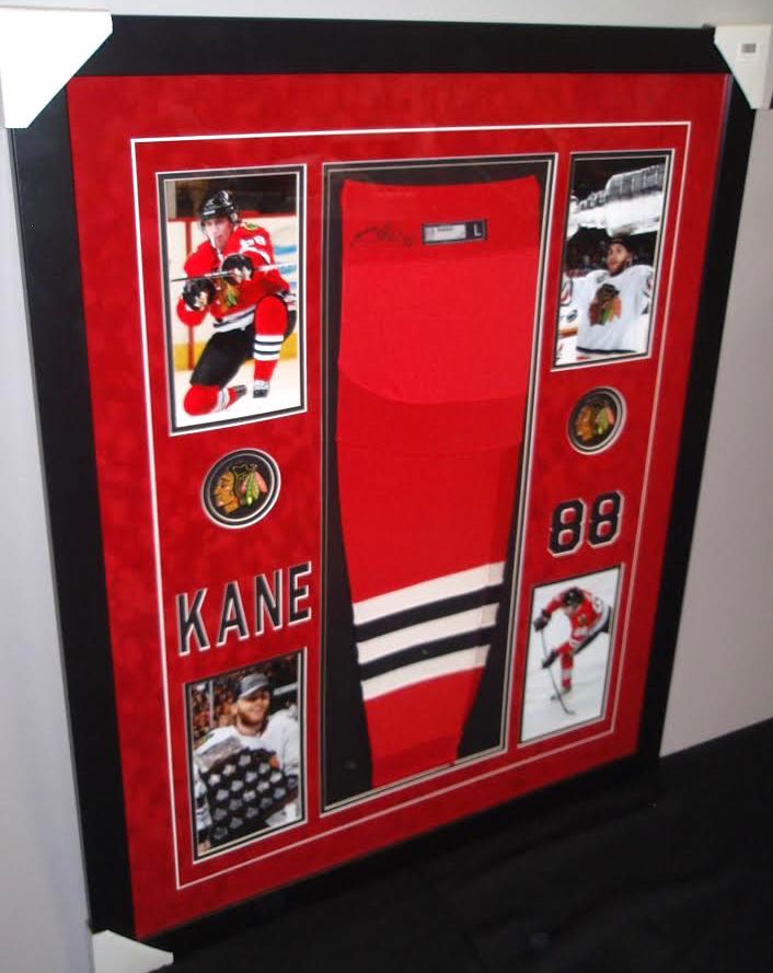 Patrick Kane Signed Blackhawks 35x43 Custom Framed Game-Used Sock Display (JSA LOA) at PristineAuction.com Patrick Kane Signed Blackhawks 35x43 Custom Framed Game-Used Sock Display (JSA LOA) at PristineAuction.com
