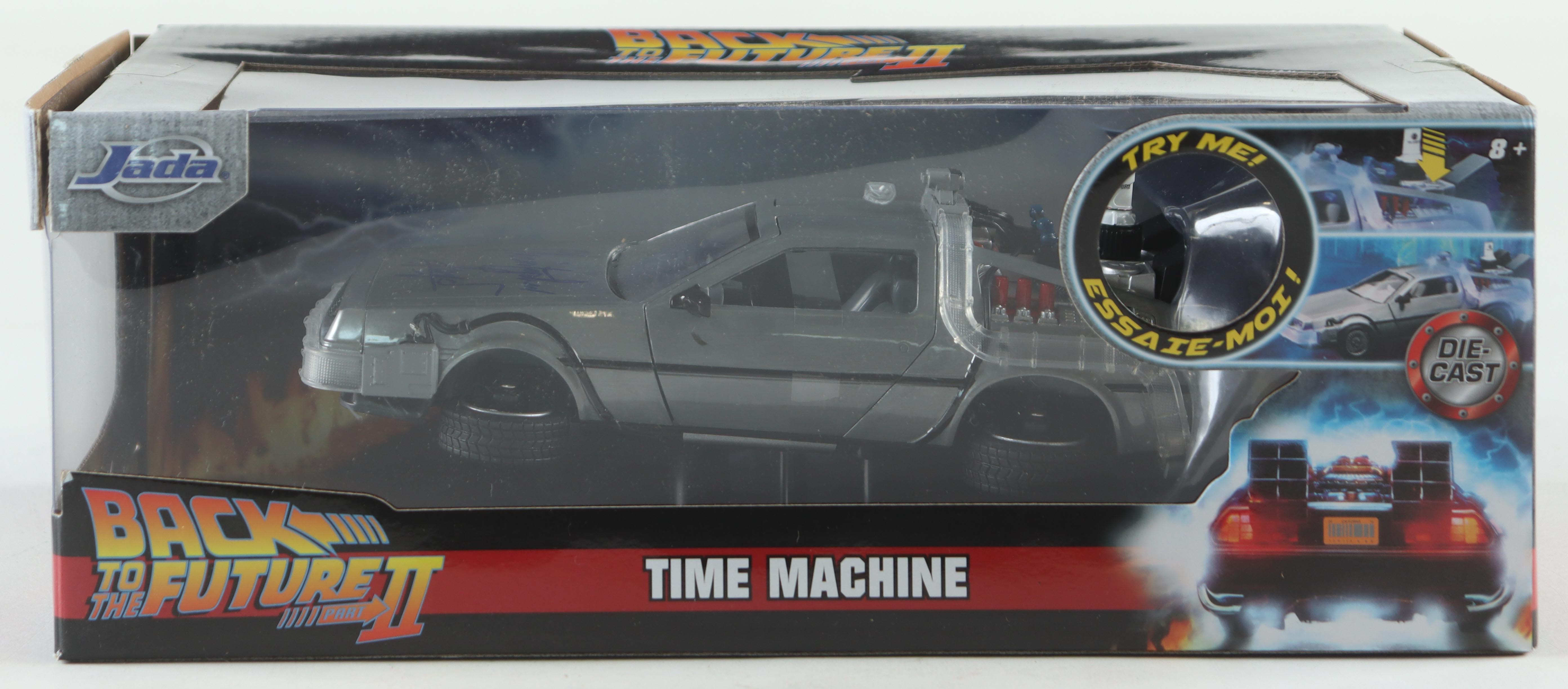 Christopher Lloyd Signed "Back to the Future" DeLorean Time Machine 1:24 Scale Die-Cast Car (Beckett) at PristineAuction.com Christopher Lloyd Signed "Back to the Future" DeLorean Time Machine 1:24 Scale Die-Cast Car (Beckett) at PristineAuction.com