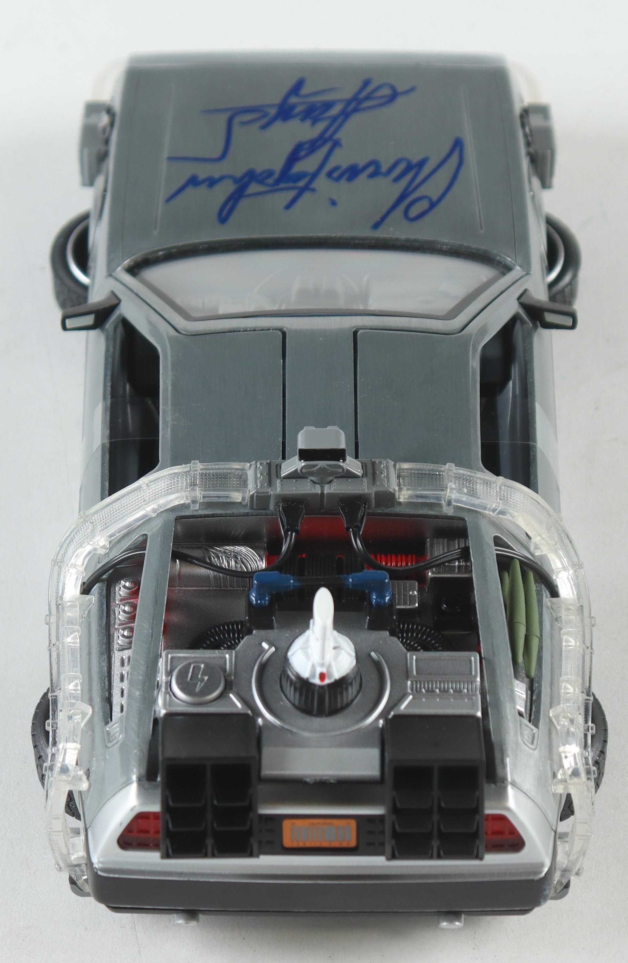 Christopher Lloyd Signed "Back to the Future" DeLorean Time Machine 1:24 Scale Die-Cast Car (Beckett) at PristineAuction.com Christopher Lloyd Signed "Back to the Future" DeLorean Time Machine 1:24 Scale Die-Cast Car (Beckett) at PristineAuction.com