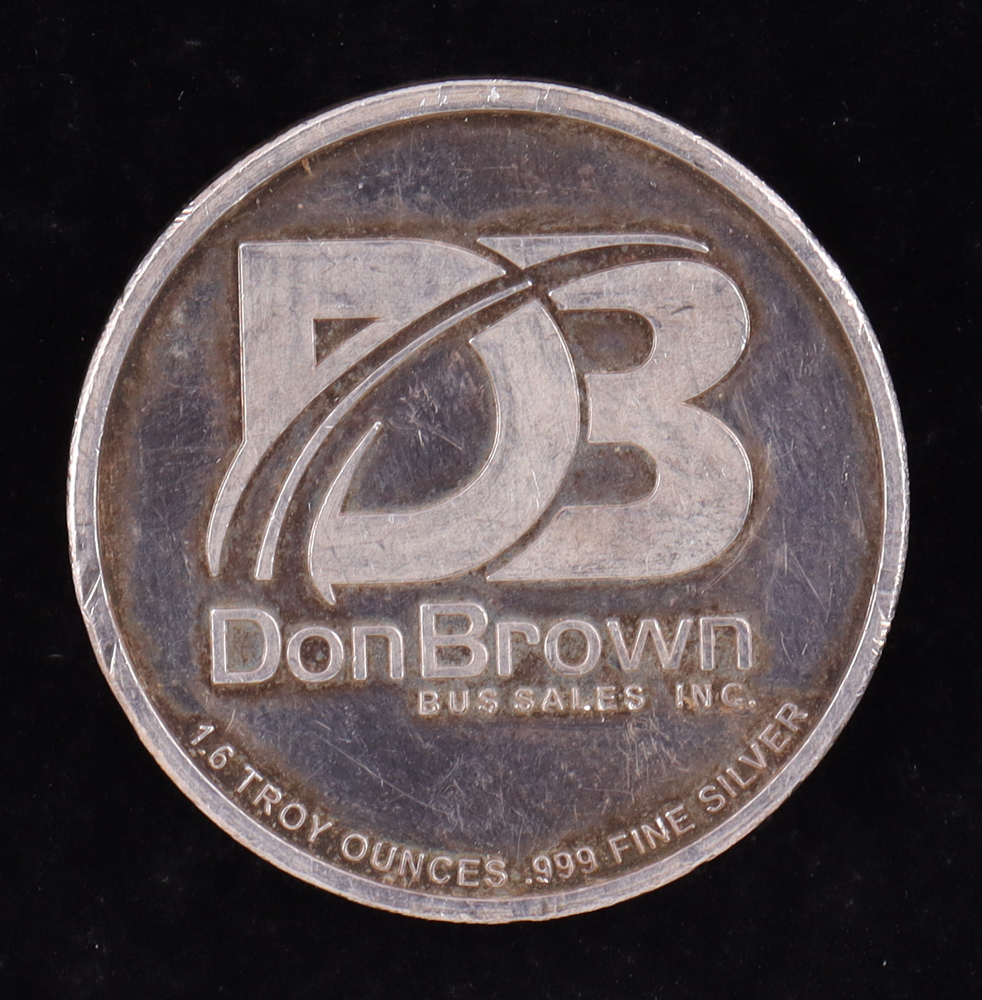 Don Brown The Momentum Theorem Vintage 1.6oz .999 Fine Silver Bullion Coin at PristineAuction.com Don Brown The Momentum Theorem Vintage 1.6oz .999 Fine Silver Bullion Coin at PristineAuction.com