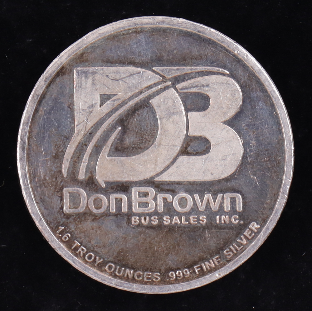 Don Brown The Momentum Theorem Vintage 1.6oz .999 Fine Silver Bullion Coin at PristineAuction.com Don Brown The Momentum Theorem Vintage 1.6oz .999 Fine Silver Bullion Coin at PristineAuction.com