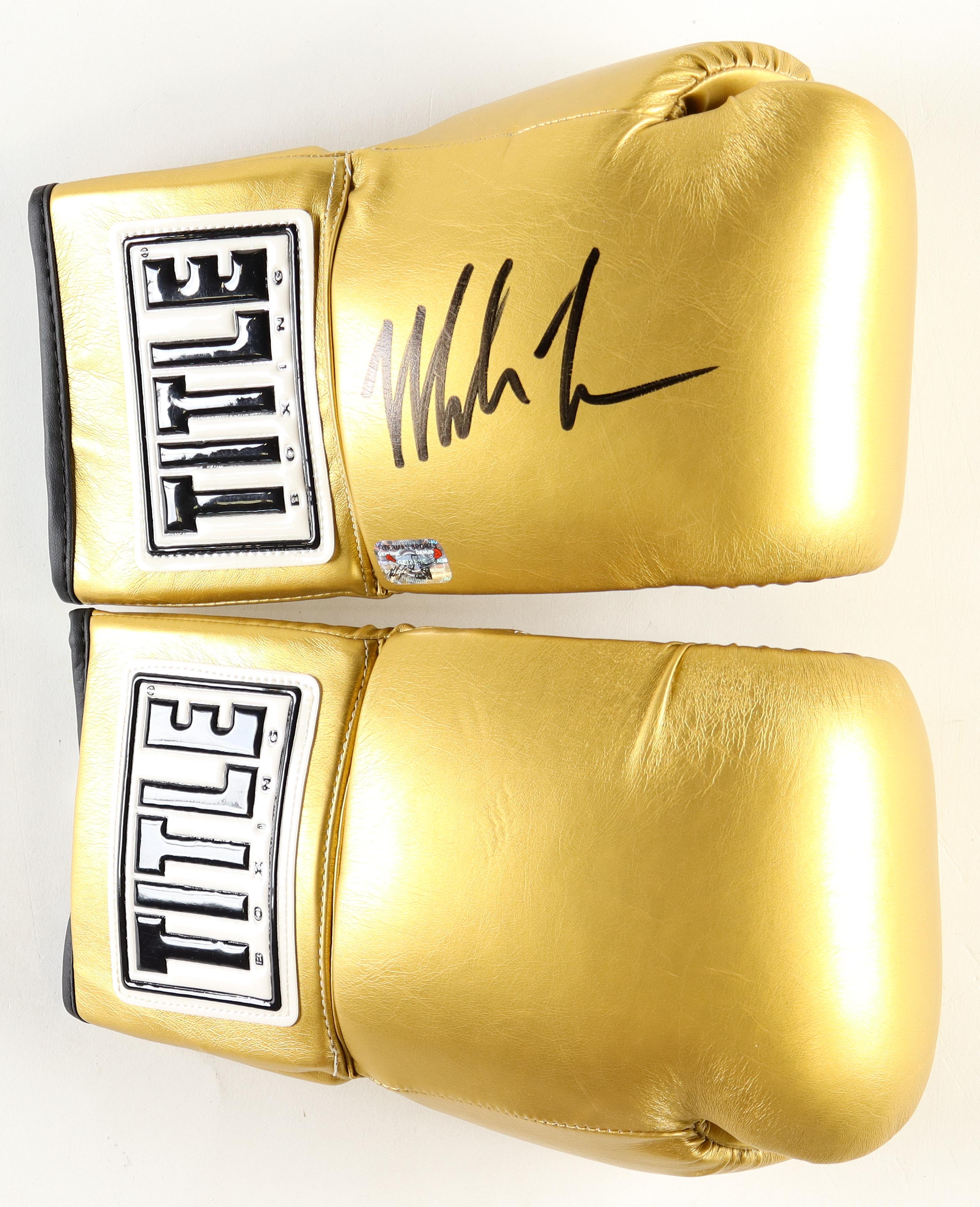 Mike Tyson Signed Pair of Everlast Boxing Gloves (Tyson) at PristineAuction.com Mike Tyson Signed Pair of Everlast Boxing Gloves (Tyson) at PristineAuction.com