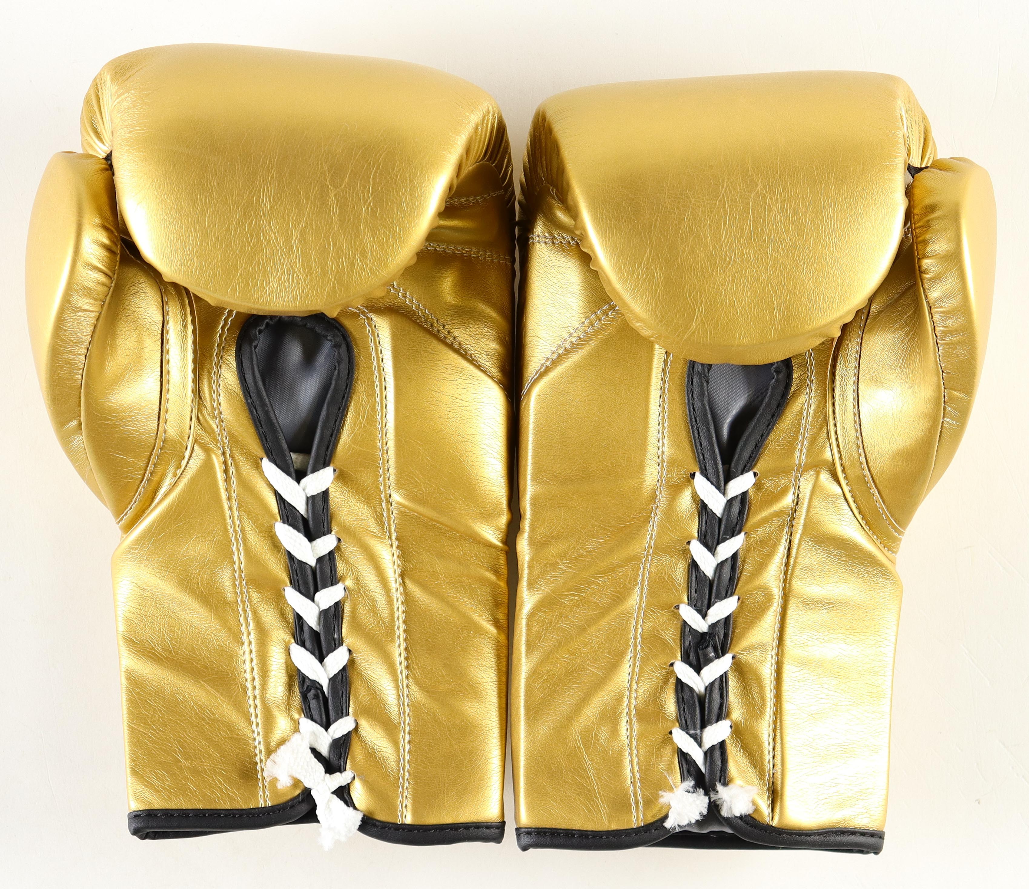 Mike Tyson Signed Pair of Everlast Boxing Gloves (Tyson) at PristineAuction.com Mike Tyson Signed Pair of Everlast Boxing Gloves (Tyson) at PristineAuction.com