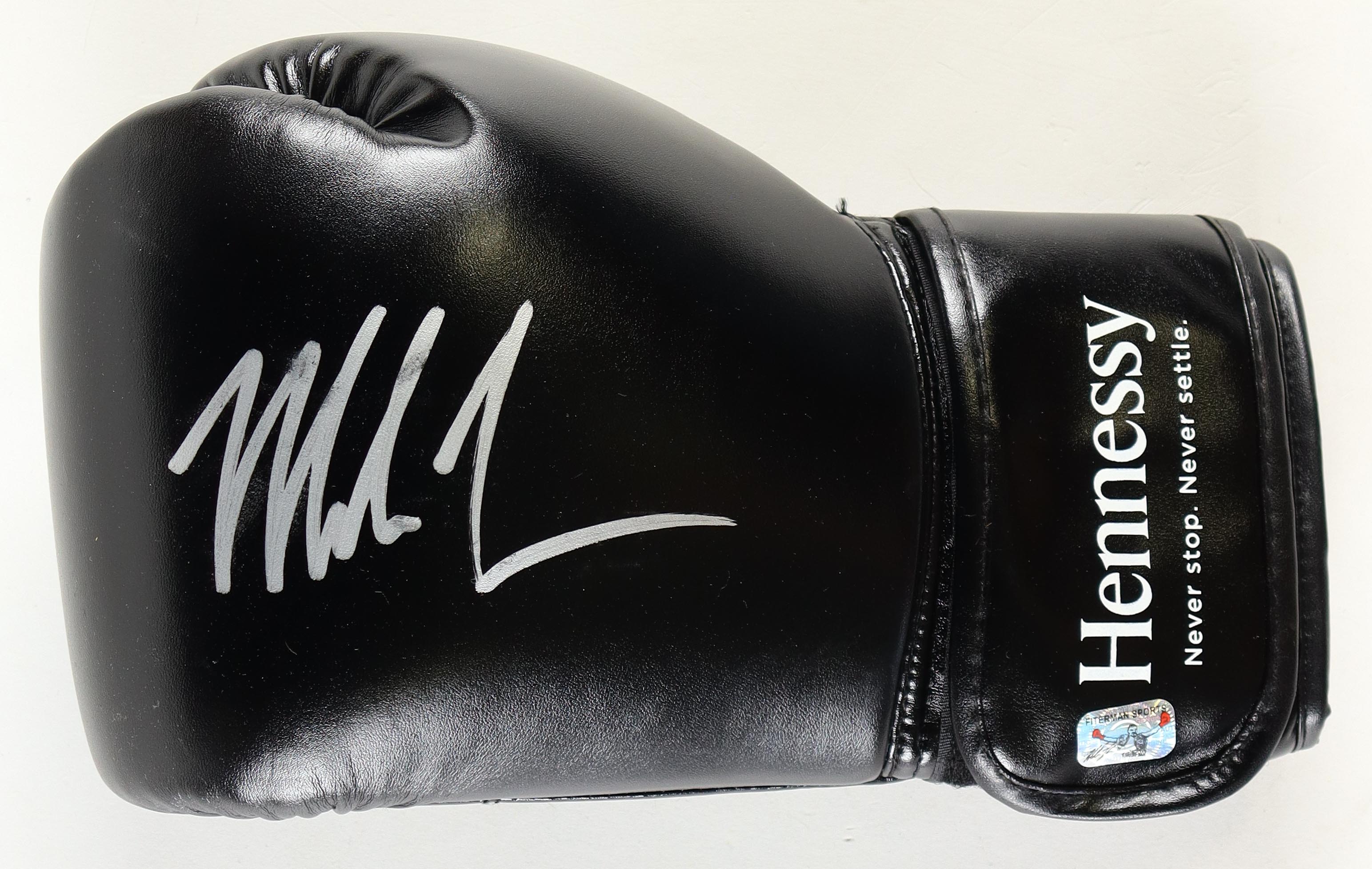 Mike Tyson Signed Hennessy Sponsor Only Boxing Glove With Name Plaque & Display Stand (Tyson) at PristineAuction.com Mike Tyson Signed Hennessy Sponsor Only Boxing Glove With Name Plaque & Display Stand (Tyson) at PristineAuction.com