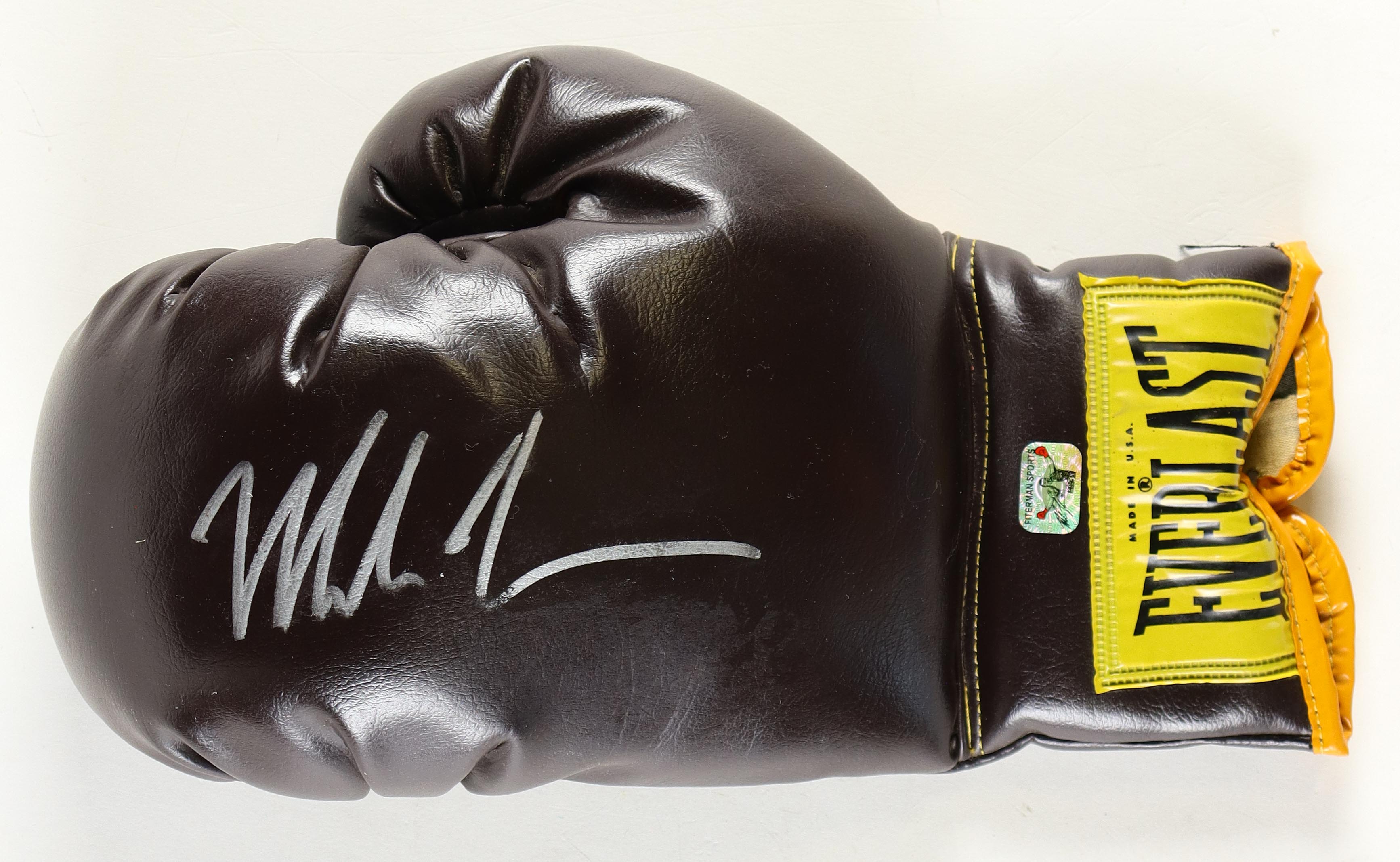 Mike Tyson Signed Vintage Everlast Brown Boxing Glove (Tyson) at PristineAuction.com Mike Tyson Signed Vintage Everlast Brown Boxing Glove (Tyson) at PristineAuction.com