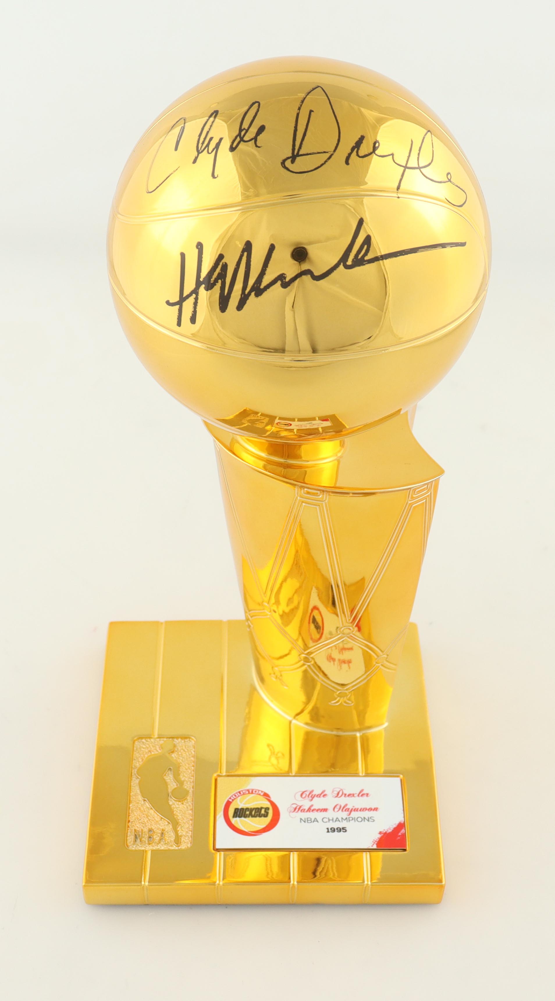 Hakeem Olajuwon & Clyde Drexler Signed Rockets 1995 NBA Champions Replica Trophy (Beckett) at PristineAuction.com Hakeem Olajuwon & Clyde Drexler Signed Rockets 1995 NBA Champions Replica Trophy (Beckett) at PristineAuction.com