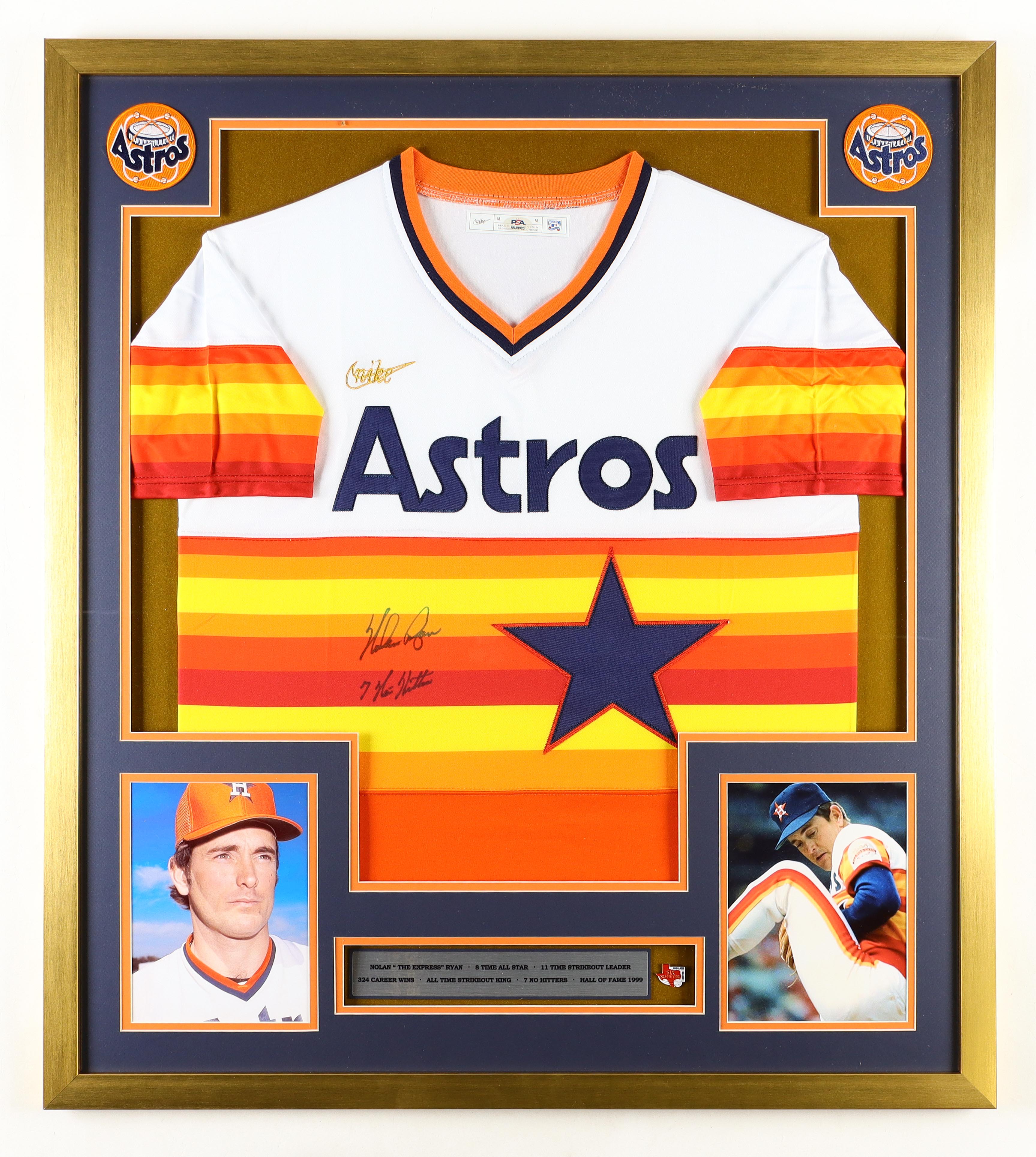 Nolan Ryan Signed Custom Framed Nike Jersey Display Inscribed "7 No Hitters" with (2) Cloth Logo Patches & Player 6th Hitter Pin (PSA) at PristineAuction.com Nolan Ryan Signed Custom Framed Nike Jersey Display Inscribed "7 No Hitters" with (2) Cloth Logo Patches & Player 6th Hitter Pin (PSA) at PristineAuction.com