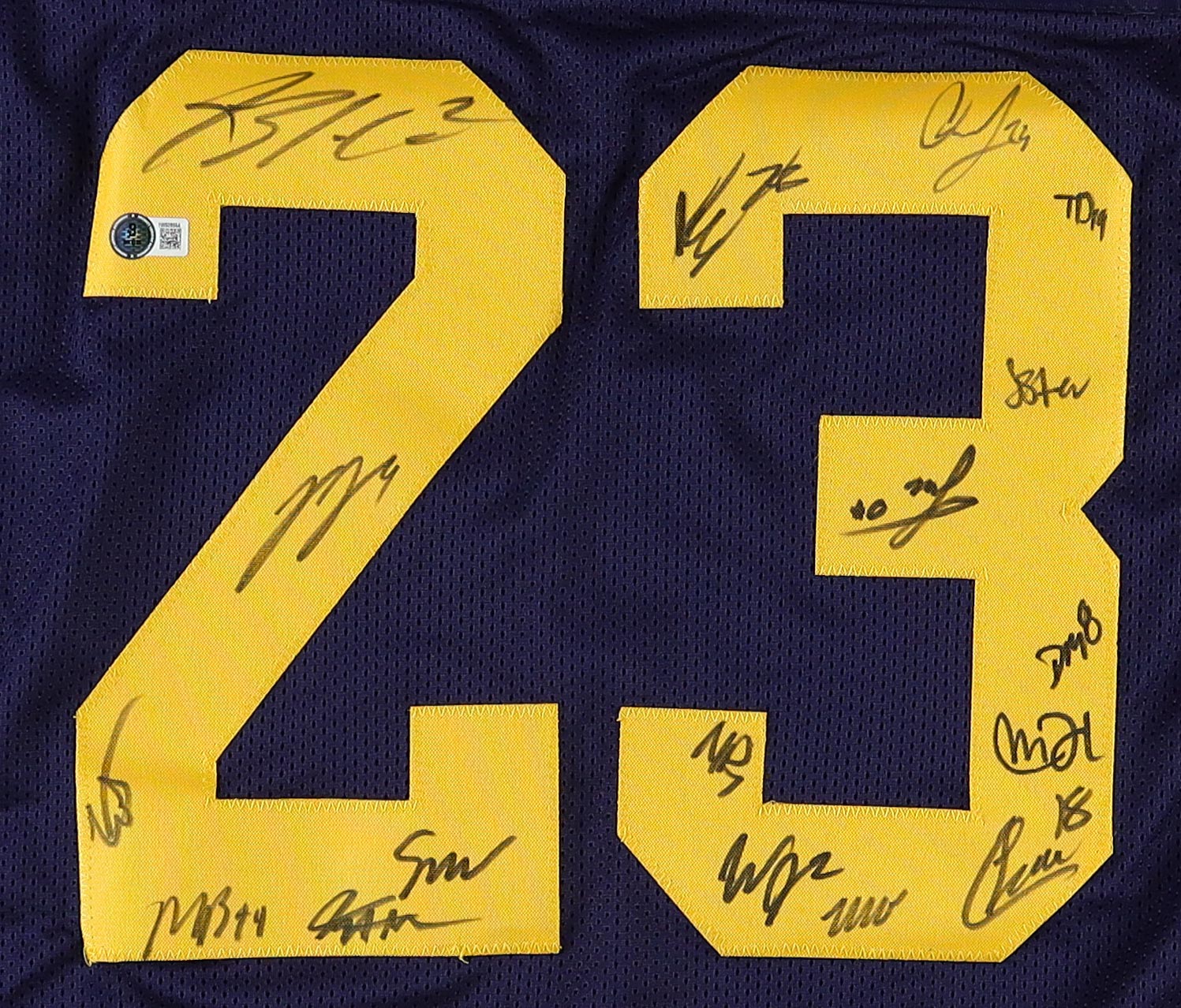 2023 Michigan Wolverines Team Highlight Stat Jersey Team-Signed by (17) with J.J. McCarthy, Blake Corum, Colston Loveland, Mike Sainristil (Beckett) at PristineAuction.com 2023 Michigan Wolverines Team Highlight Stat Jersey Team-Signed by (17) with J.J. McCarthy, Blake Corum, Colston Loveland, Mike Sainristil (Beckett) at PristineAuction.com