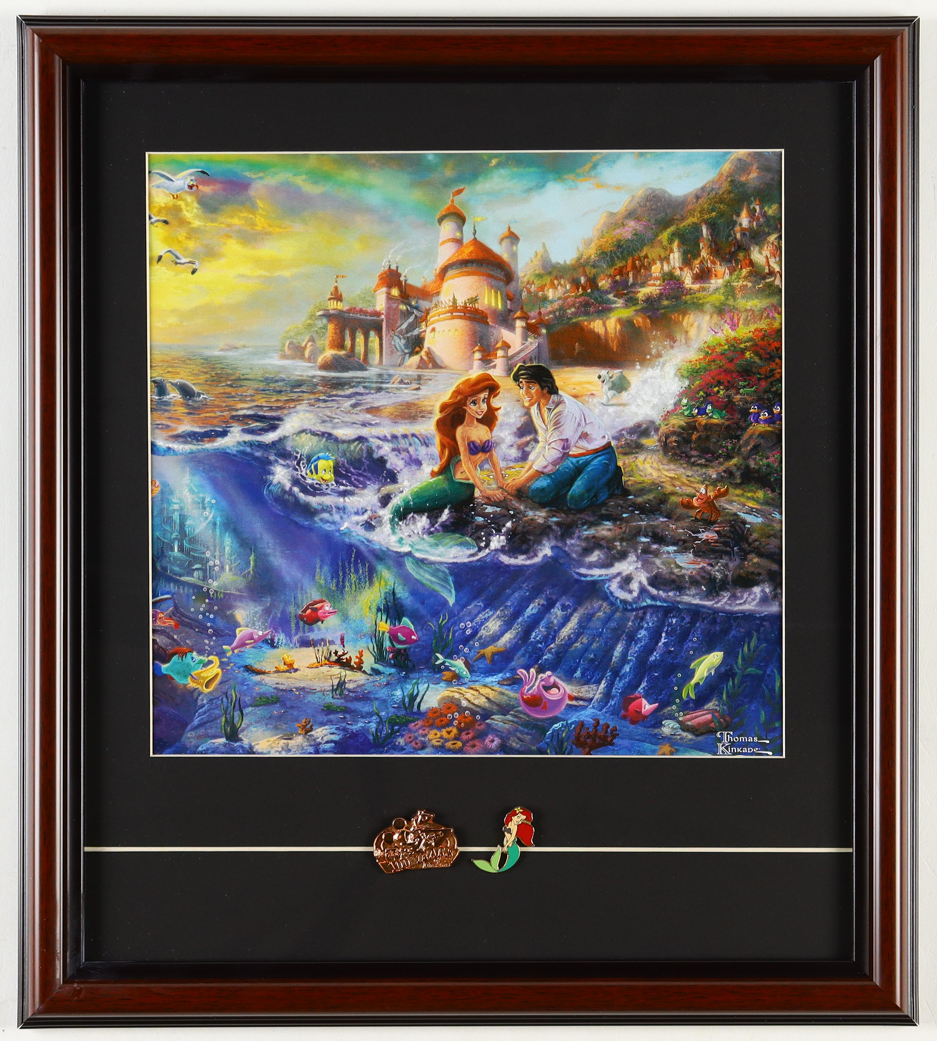 Thomas Kinkade "The Little Mermaid" Custom Framed Print Display With Anniversary & Character Pins at PristineAuction.com Thomas Kinkade "The Little Mermaid" Custom Framed Print Display With Anniversary & Character Pins at PristineAuction.com