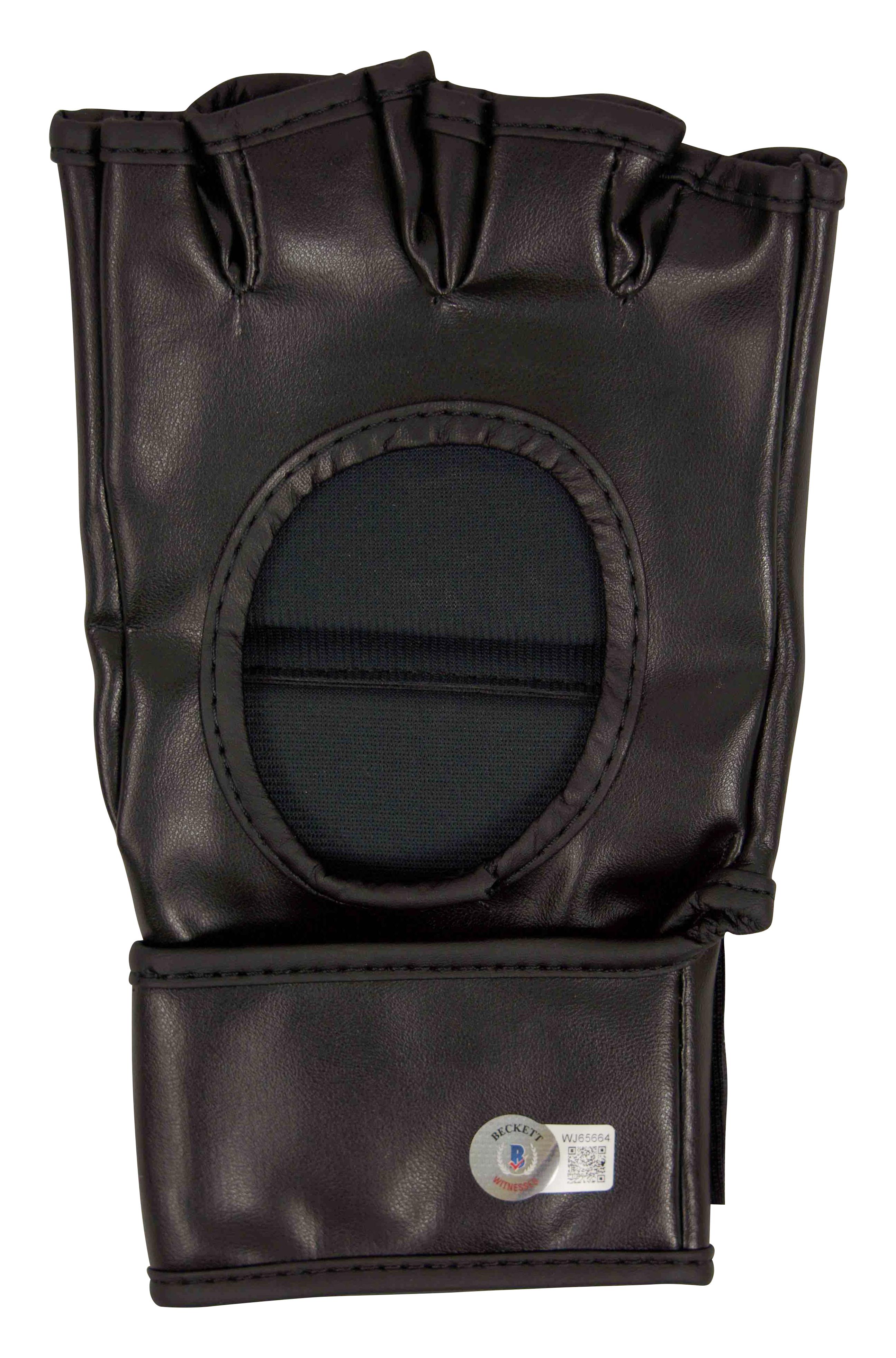 Conor McGregor Signed MMA Glove (Beckett) at PristineAuction.com Conor McGregor Signed MMA Glove (Beckett) at PristineAuction.com