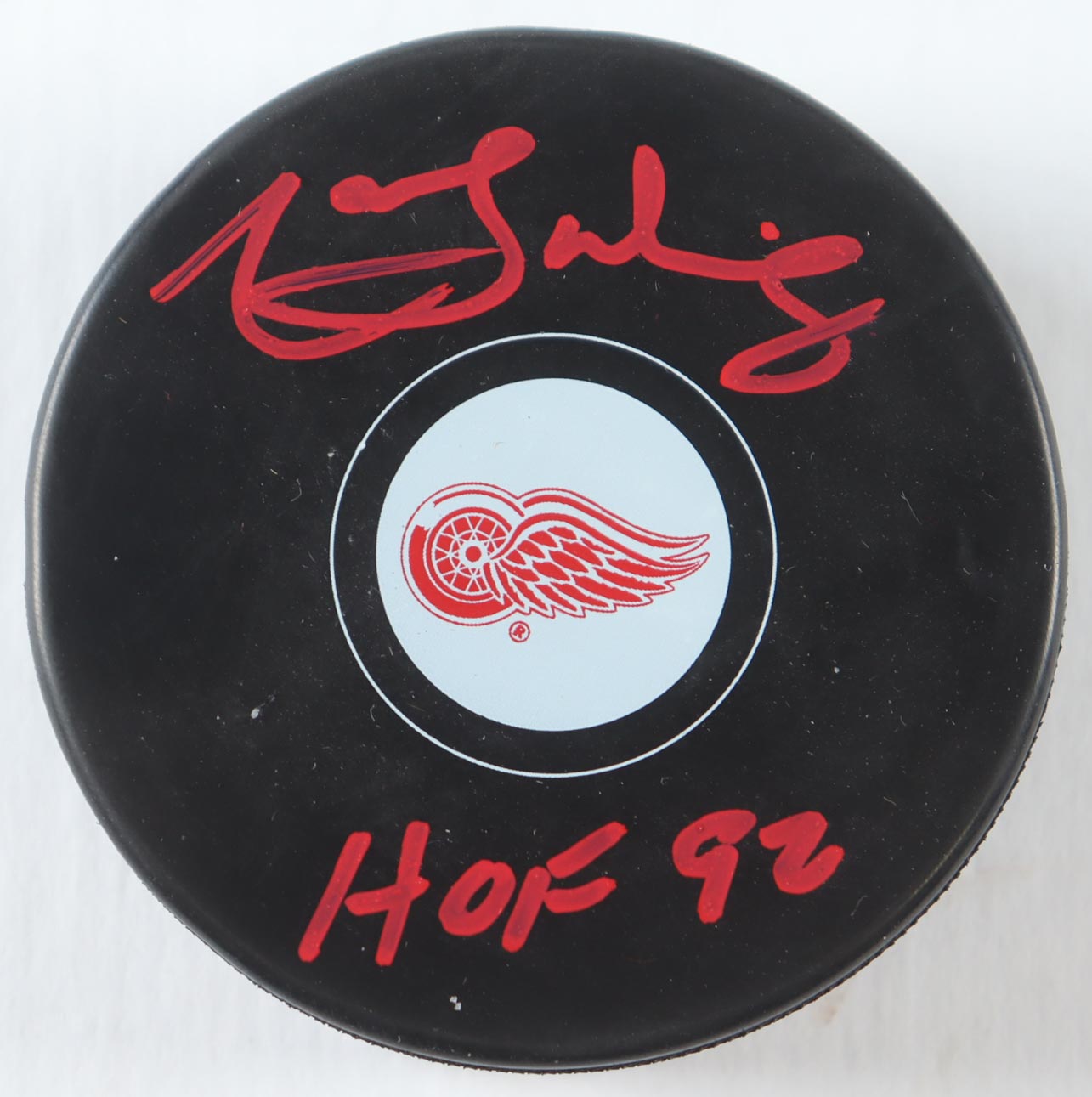 Marcel Dionne Signed Red Wings Logo Hockey Puck Inscribed "HOF 92" (JSA) at PristineAuction.com Marcel Dionne Signed Red Wings Logo Hockey Puck Inscribed "HOF 92" (JSA) at PristineAuction.com
