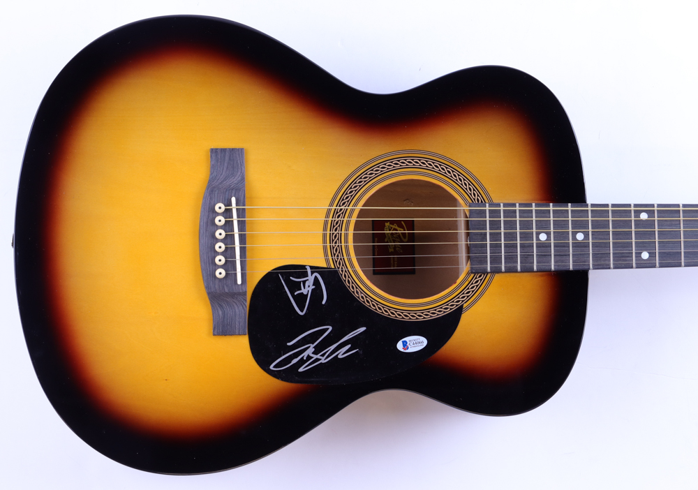 Tyler Hubbard & Brian Kelley Signed Full-Size Acoustic Guitar (Beckett) at PristineAuction.com Tyler Hubbard & Brian Kelley Signed Full-Size Acoustic Guitar (Beckett) at PristineAuction.com