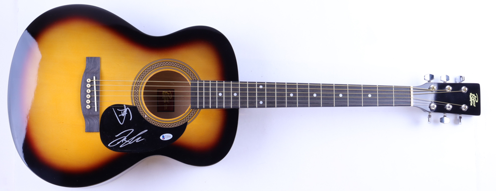 Tyler Hubbard & Brian Kelley Signed Full-Size Acoustic Guitar (Beckett) at PristineAuction.com Tyler Hubbard & Brian Kelley Signed Full-Size Acoustic Guitar (Beckett) at PristineAuction.com