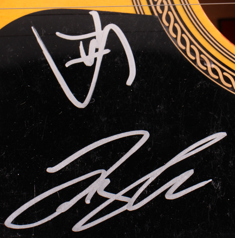 Tyler Hubbard & Brian Kelley Signed Full-Size Acoustic Guitar (Beckett) at PristineAuction.com Tyler Hubbard & Brian Kelley Signed Full-Size Acoustic Guitar (Beckett) at PristineAuction.com