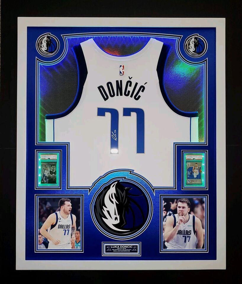 Luka Doncic Signed Mavericks Custom Framed LED Backlit Nike Jersey Display & (2) PSA 10 Graded Rookie Cards (Panini) at PristineAuction.com Luka Doncic Signed Mavericks Custom Framed LED Backlit Nike Jersey Display & (2) PSA 10 Graded Rookie Cards (Panini) at PristineAuction.com