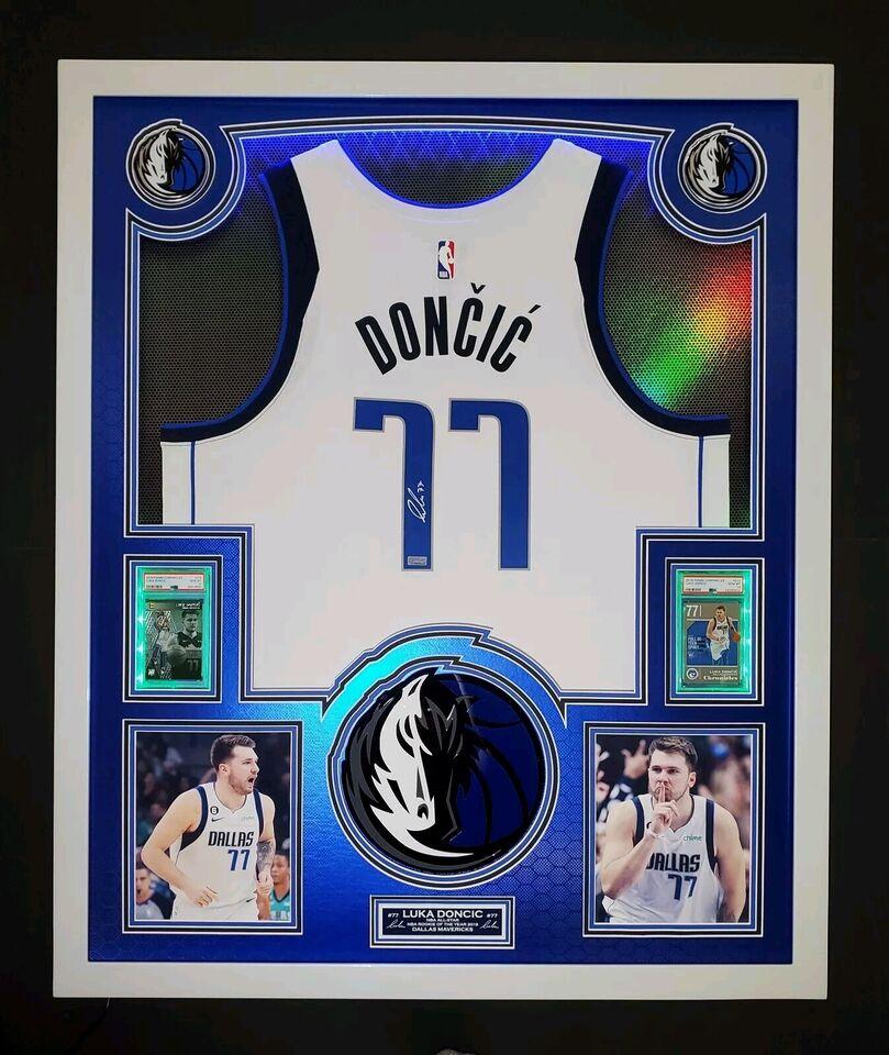 Luka Doncic Signed Mavericks Custom Framed LED Backlit Nike Jersey Display & (2) PSA 10 Graded Rookie Cards (Panini) at PristineAuction.com Luka Doncic Signed Mavericks Custom Framed LED Backlit Nike Jersey Display & (2) PSA 10 Graded Rookie Cards (Panini) at PristineAuction.com