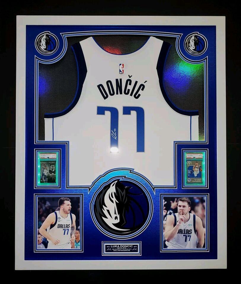 Luka Doncic Signed Mavericks Custom Framed LED Backlit Nike Jersey Display & (2) PSA 10 Graded Rookie Cards (Panini) at PristineAuction.com Luka Doncic Signed Mavericks Custom Framed LED Backlit Nike Jersey Display & (2) PSA 10 Graded Rookie Cards (Panini) at PristineAuction.com