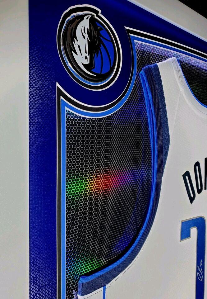 Luka Doncic Signed Mavericks Custom Framed LED Backlit Nike Jersey Display & (2) PSA 10 Graded Rookie Cards (Panini) at PristineAuction.com Luka Doncic Signed Mavericks Custom Framed LED Backlit Nike Jersey Display & (2) PSA 10 Graded Rookie Cards (Panini) at PristineAuction.com