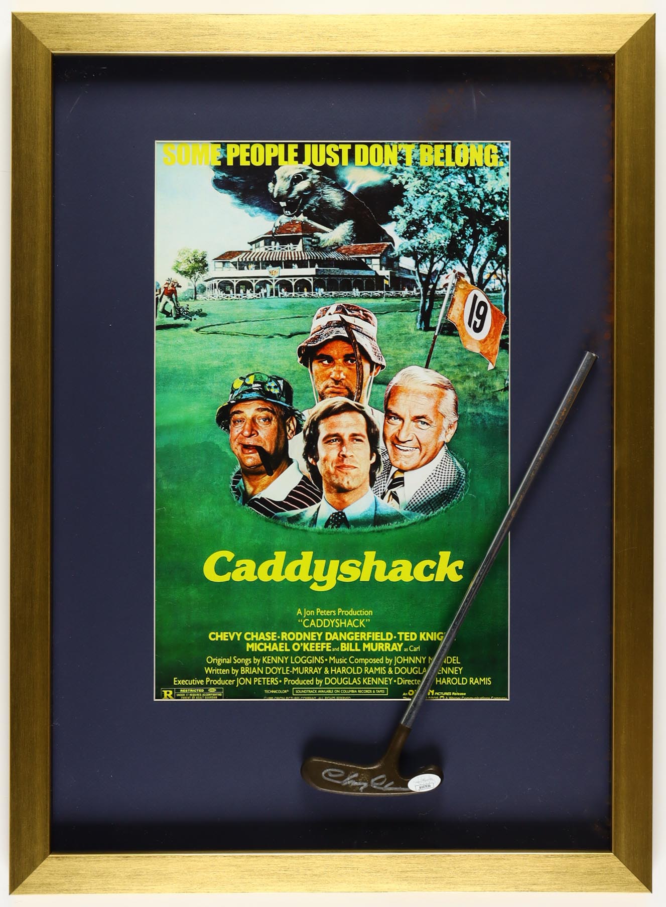 Chevy Chase Signed "Caddyshack" Custom Framed Putter Display With Poster Print (JSA) at PristineAuction.com Chevy Chase Signed "Caddyshack" Custom Framed Putter Display With Poster Print (JSA) at PristineAuction.com