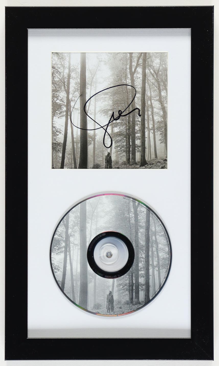 Taylor Swift Signed Custom Framed "Folklore" CD Booklet Display (JSA) at PristineAuction.com Taylor Swift Signed Custom Framed "Folklore" CD Booklet Display (JSA) at PristineAuction.com