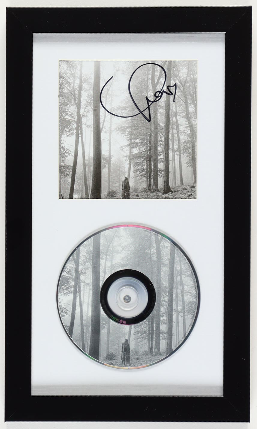 Taylor Swift Signed Custom Framed "Folklore" CD Booklet Display (JSA) at PristineAuction.com Taylor Swift Signed Custom Framed "Folklore" CD Booklet Display (JSA) at PristineAuction.com