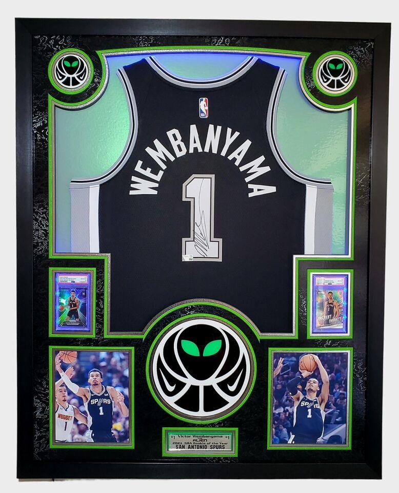 Victor Wembanyama Signed Spurs Custom Framed Nike Jersey with LED Display & (2) PSA 10 Graded Rookie Cards (Fanatics) at PristineAuction.com Victor Wembanyama Signed Spurs Custom Framed Nike Jersey with LED Display & (2) PSA 10 Graded Rookie Cards (Fanatics) at PristineAuction.com