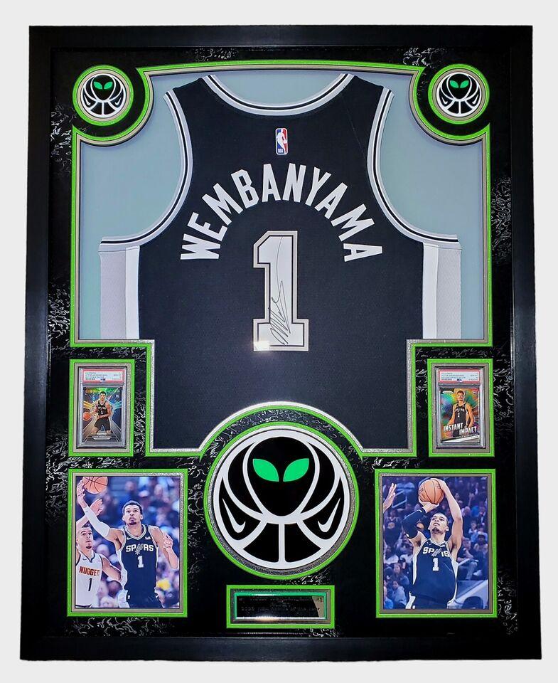 Victor Wembanyama Signed Spurs Custom Framed Nike Jersey with LED Display & (2) PSA 10 Graded Rookie Cards (Fanatics) at PristineAuction.com Victor Wembanyama Signed Spurs Custom Framed Nike Jersey with LED Display & (2) PSA 10 Graded Rookie Cards (Fanatics) at PristineAuction.com