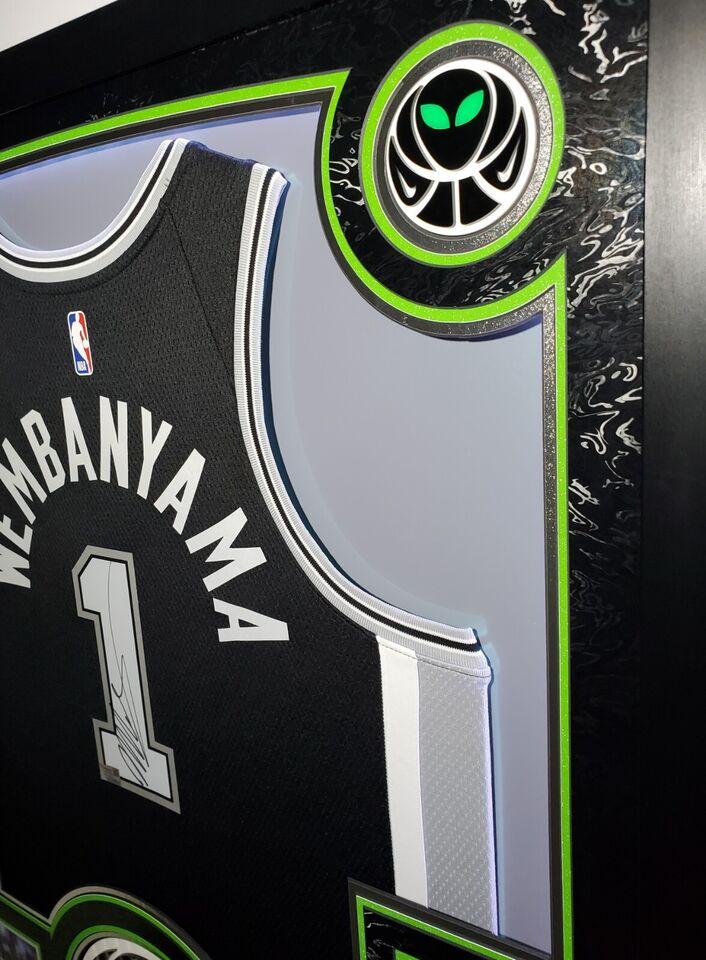 Victor Wembanyama Signed Spurs Custom Framed Nike Jersey with LED Display & (2) PSA 10 Graded Rookie Cards (Fanatics) at PristineAuction.com Victor Wembanyama Signed Spurs Custom Framed Nike Jersey with LED Display & (2) PSA 10 Graded Rookie Cards (Fanatics) at PristineAuction.com