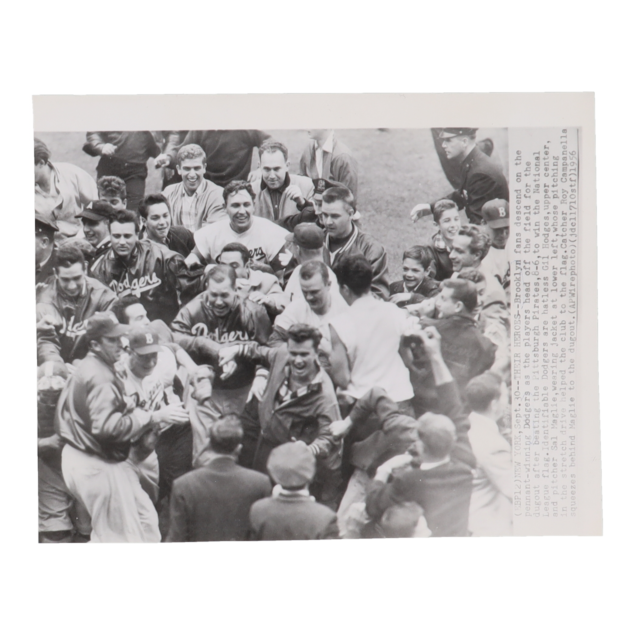 Dodgers 1956 World Series Champions 8x10 Vintage AP Wire Photo at PristineAuction.com Dodgers 1956 World Series Champions 8x10 Vintage AP Wire Photo at PristineAuction.com