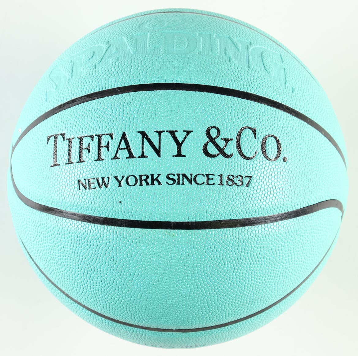 Magic Johnson Signed Tiffany & Co. x Spalding Basketball with All Wood Stand (Beckett) at PristineAuction.com Magic Johnson Signed Tiffany & Co. x Spalding Basketball with All Wood Stand (Beckett) at PristineAuction.com