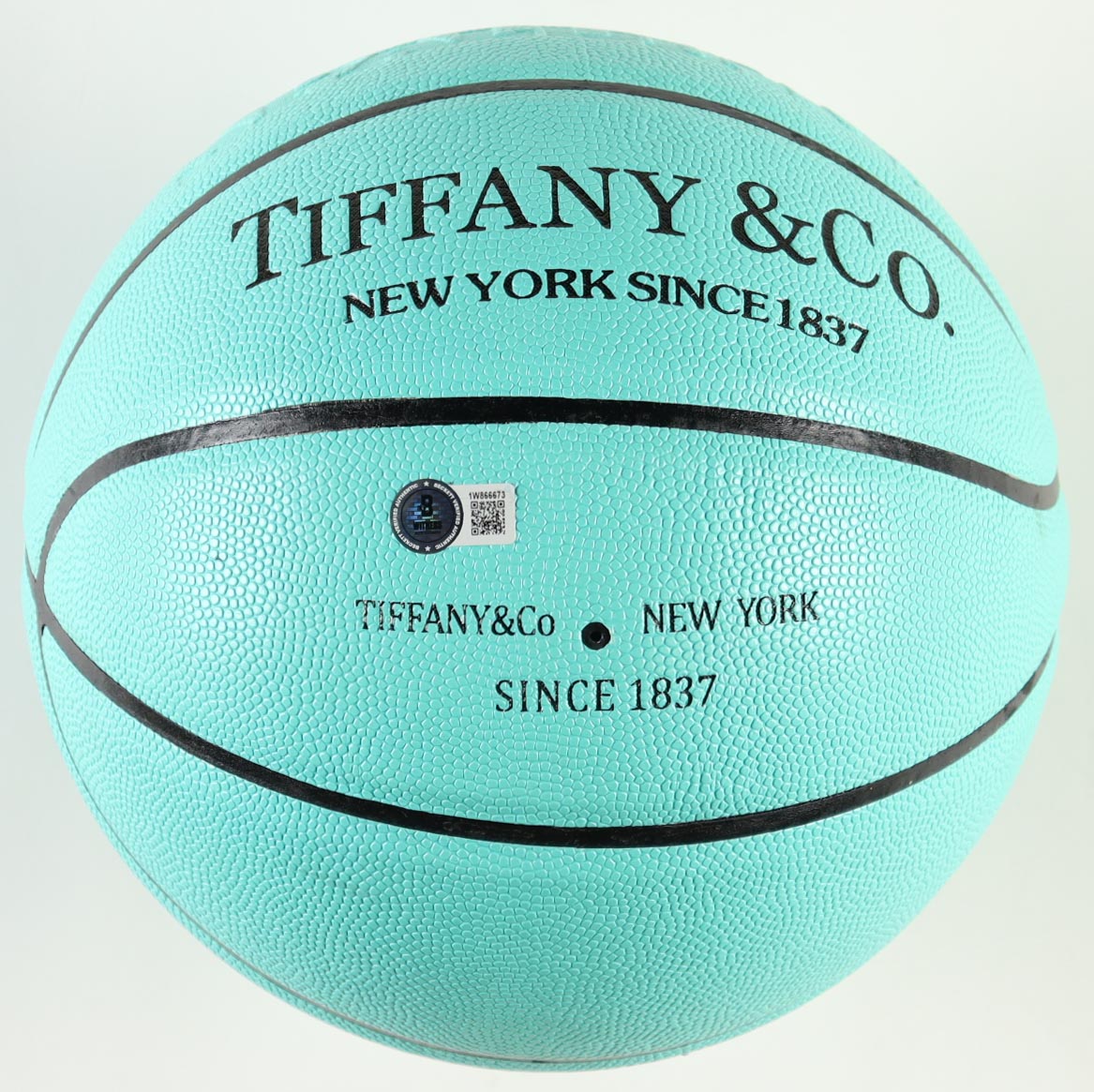 Magic Johnson Signed Tiffany & Co. x Spalding Basketball with All Wood Stand (Beckett) at PristineAuction.com Magic Johnson Signed Tiffany & Co. x Spalding Basketball with All Wood Stand (Beckett) at PristineAuction.com