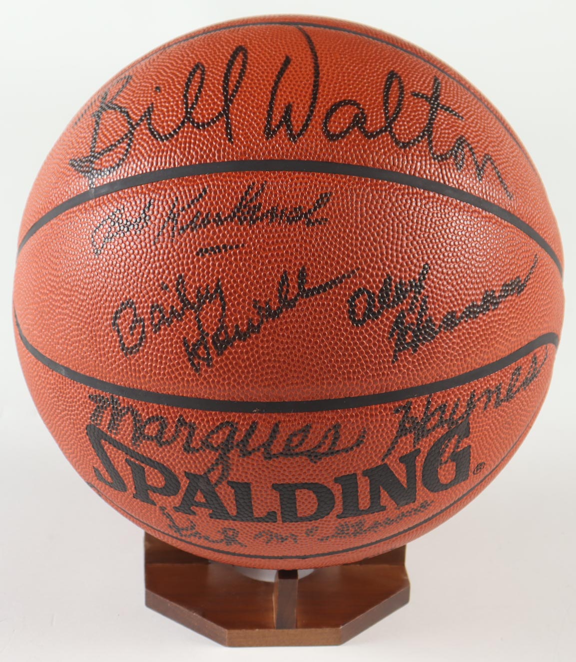 "Basketball Hall Of Famers" Spalding Basketball With Wood Display Stand Signed By (8) With Bill Walton, K.C. Jones, Bob Kurland, Red Holzman (PSA) at PristineAuction.com "Basketball Hall Of Famers" Spalding Basketball With Wood Display Stand Signed By (8) With Bill Walton, K.C. Jones, Bob Kurland, Red Holzman (PSA) at PristineAuction.com