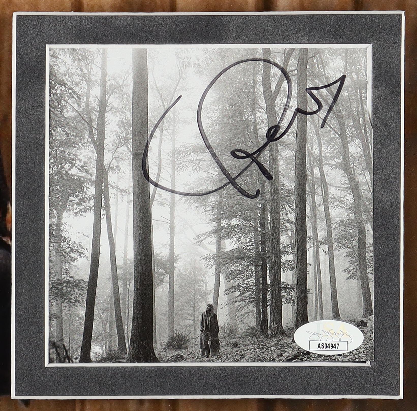 Taylor Swift Signed Custom Framed "Folklore" CD Album Insert Display (JSA) at PristineAuction.com Taylor Swift Signed Custom Framed "Folklore" CD Album Insert Display (JSA) at PristineAuction.com